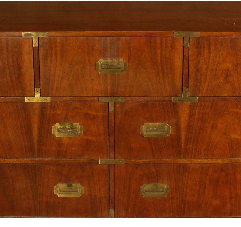 Baker mahogany Campaign style chest of drawers with handsome hardware details. Three drawers on top with four drawers below.