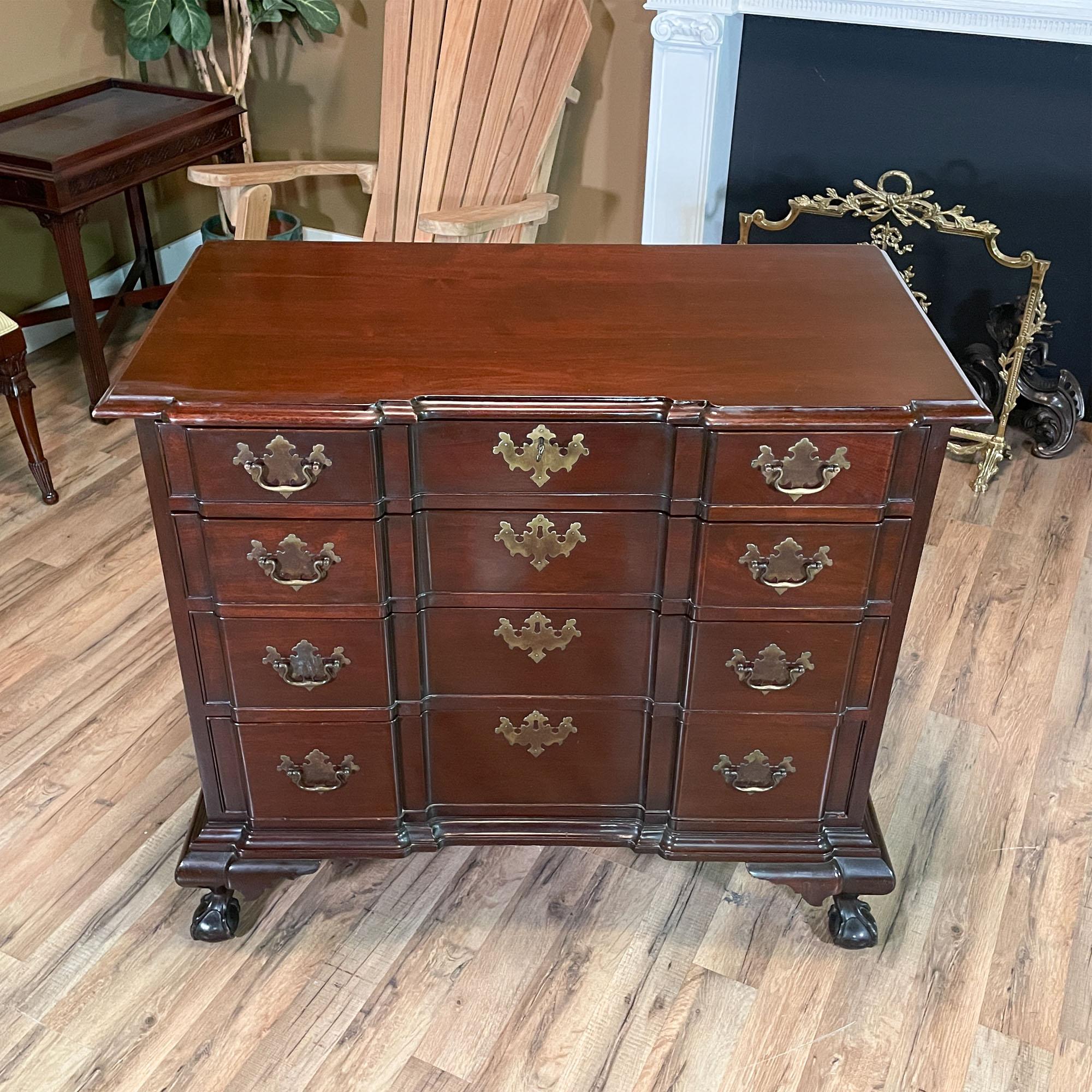 A vintage Mahogany Ball and Claw Blockfront Chest of Drawers brought to you by Niagara Furniture. A classic furniture style this blockfront shaped chest features four drawers which are each beautifully shaped and carved to  work together creating a