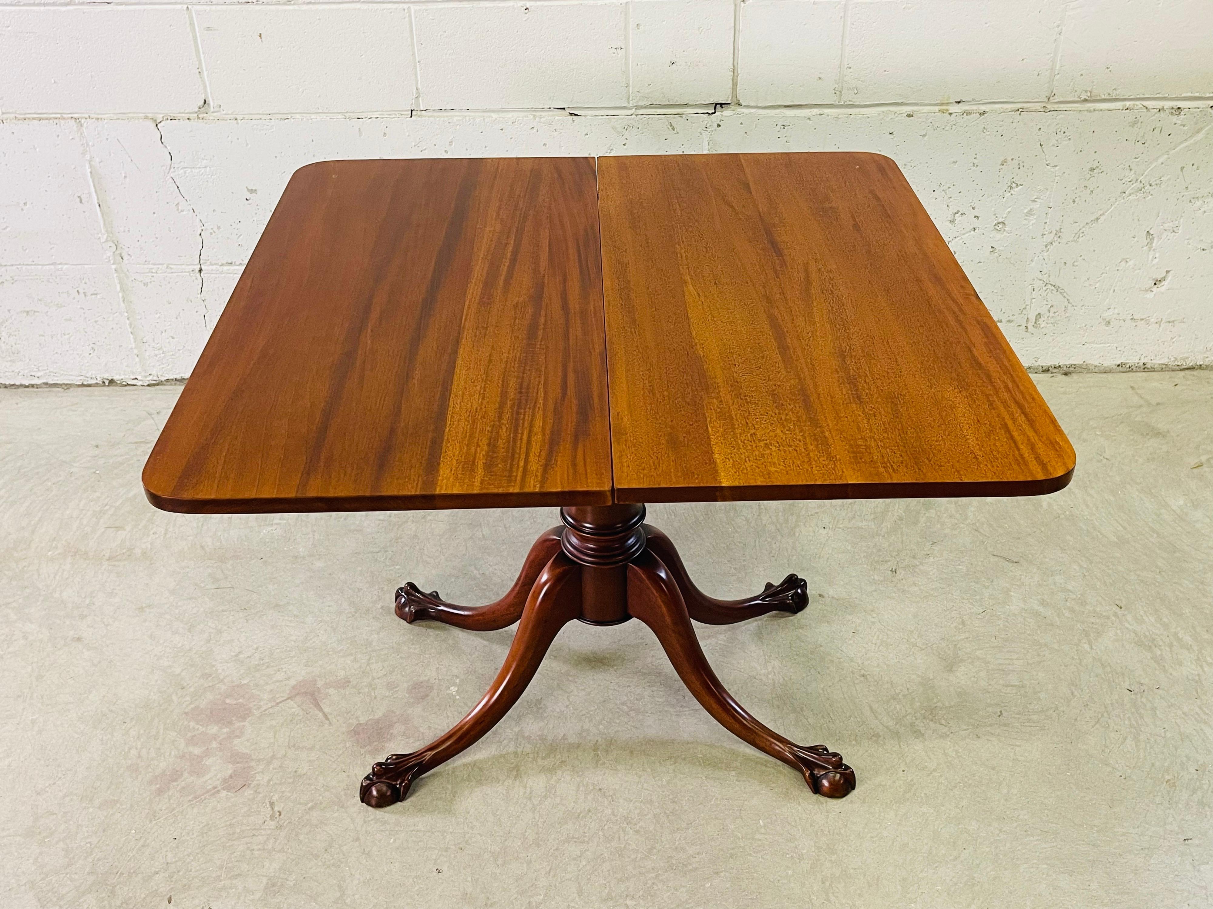 antique game table with claw feet