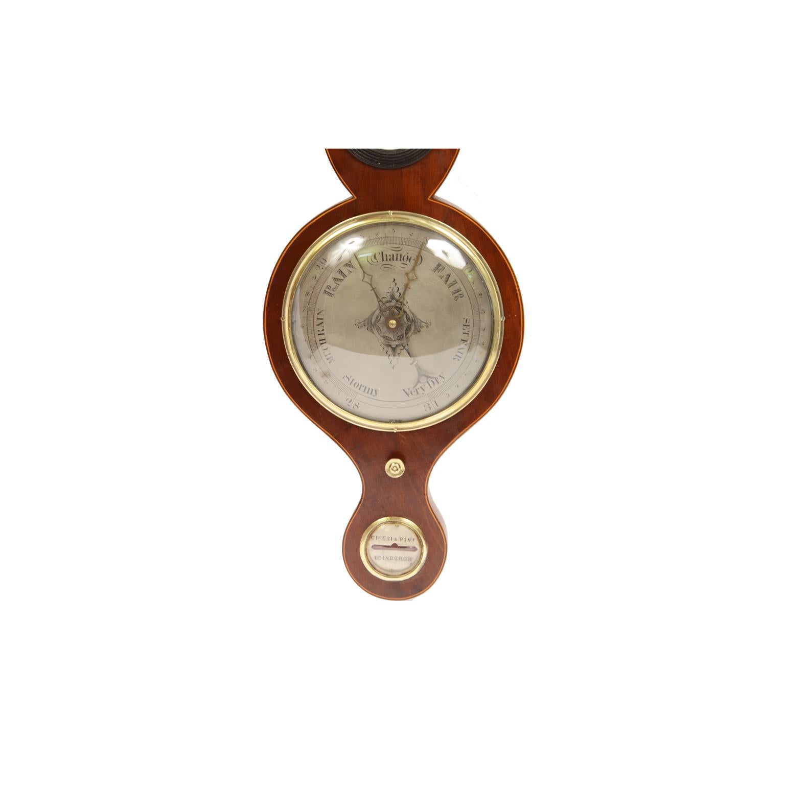 Barometer of mahogany wood with cedar wood edges, signed Ciceri and Pini active between 1842 and 1858. Silver-plated brass dial engraved with meteorological indications. The reading of the barometer is indicated by a double hand, the first one