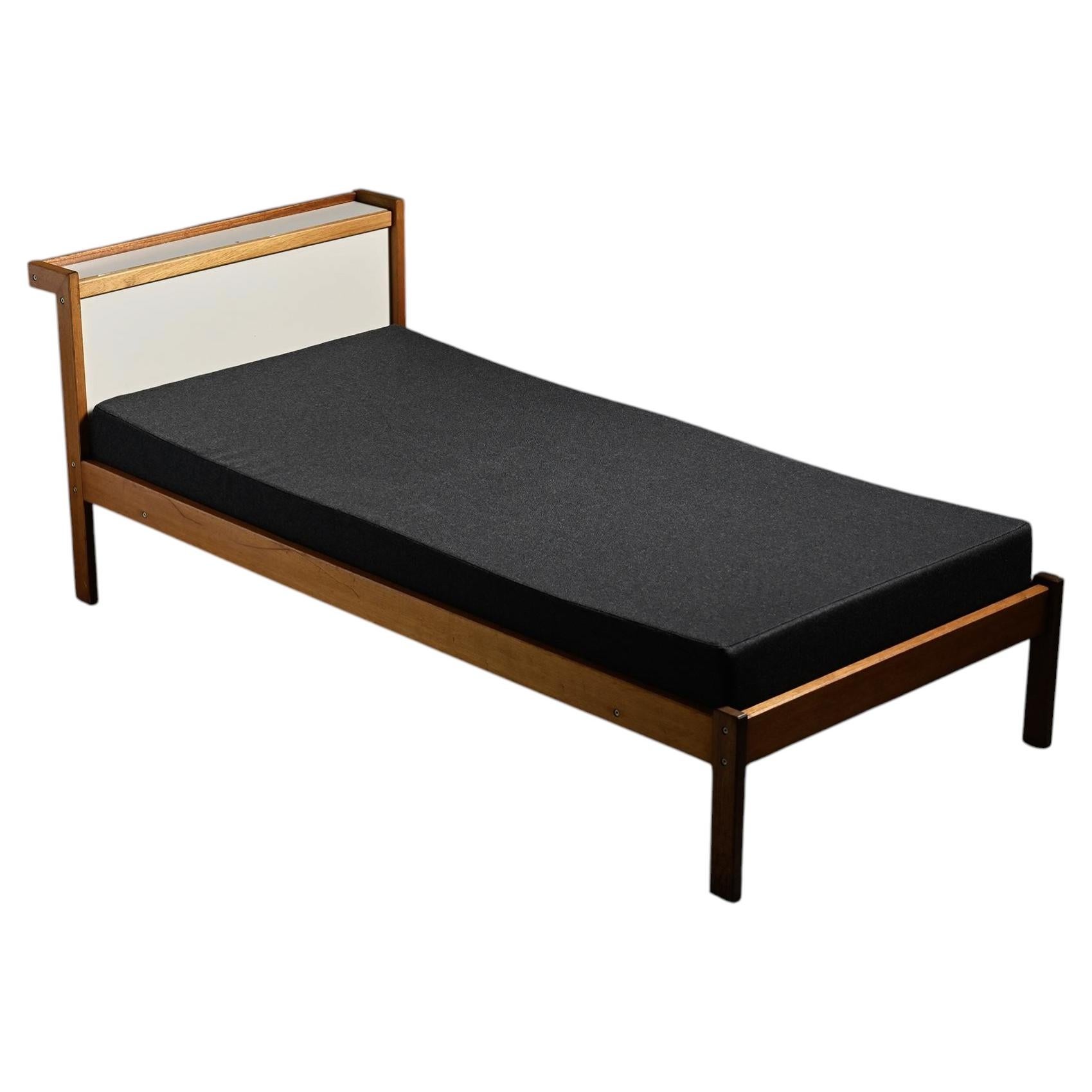 Mahogany bed  by André Sornay, France circa 1960 For Sale