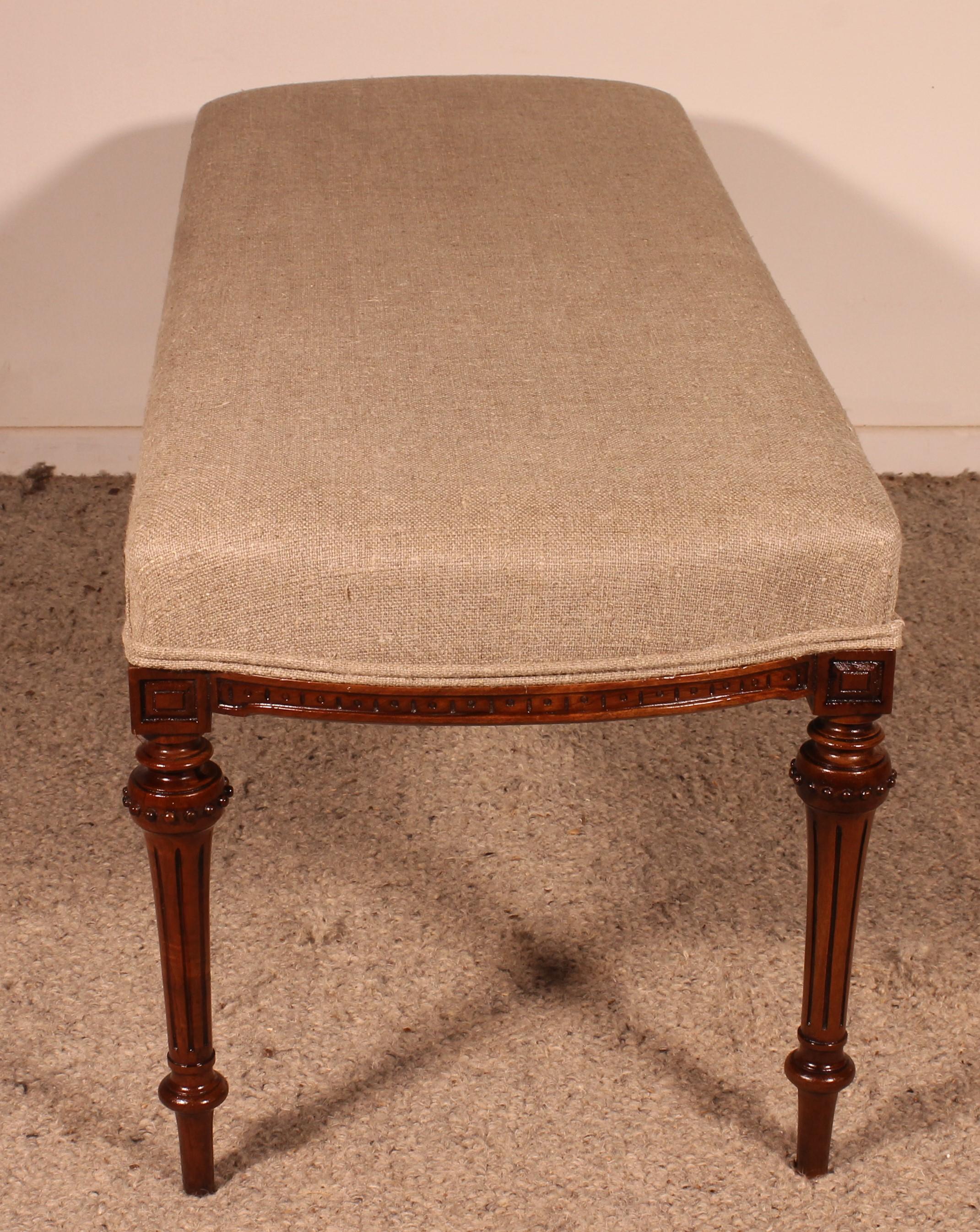 Mahogany Bench From The 19th Century Covered With A Linen Fabric For Sale 2