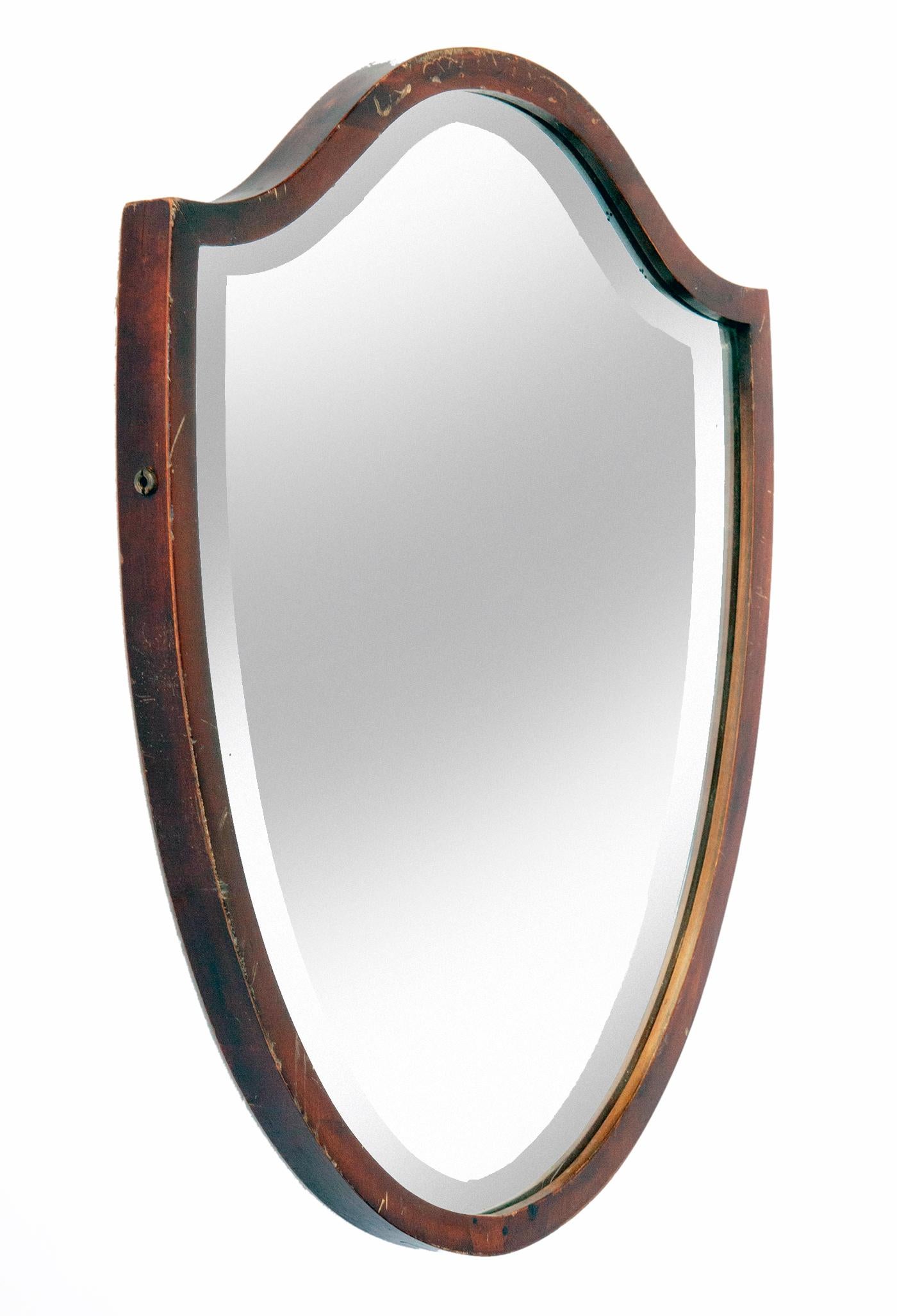 Originally a dressing mirror, this stunning mahogany beveled mirror has an very interesting shape & has a solid wood backing.
Wired to hang vertically.