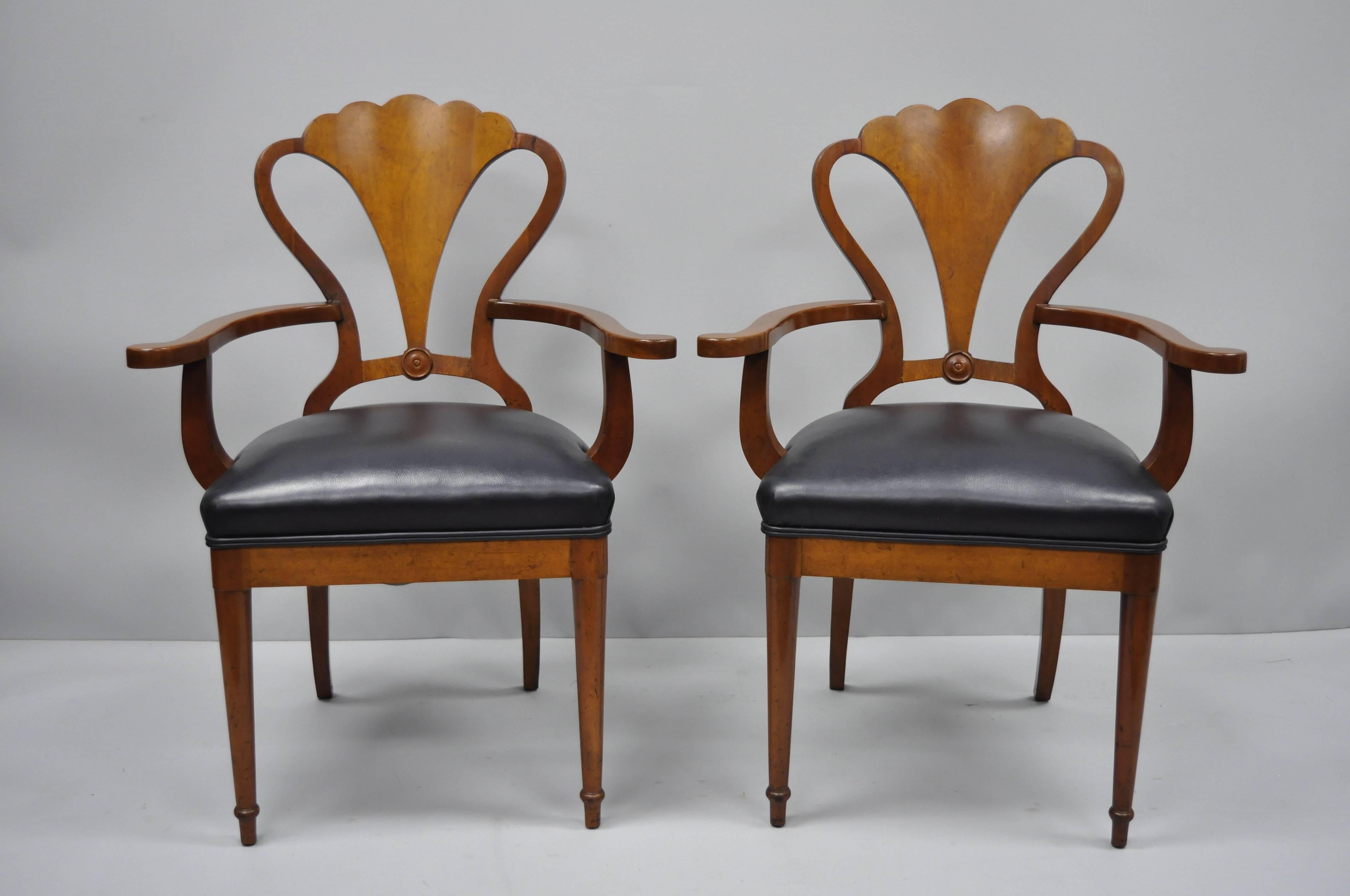 Set of six antique mahogany Biedermeier or neoclassical style shell fan back dining chairs. Item details carved fan/ shell backs, two armchairs, four side chairs, solid wood frames, vinyl upholstered seats, nicely carved details, tapered legs, sleek