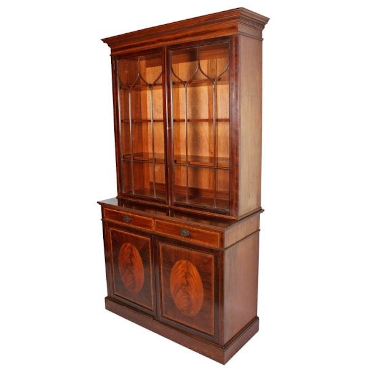 Mahogany bookcase by Waring & Gillows

An early 20th century mahogany Sheraton style bookcase by Waring & Gillows.

The bookcase has an astragal glazed two door cabinet top with three adjustable mahogany shelves.

The base has a pair of