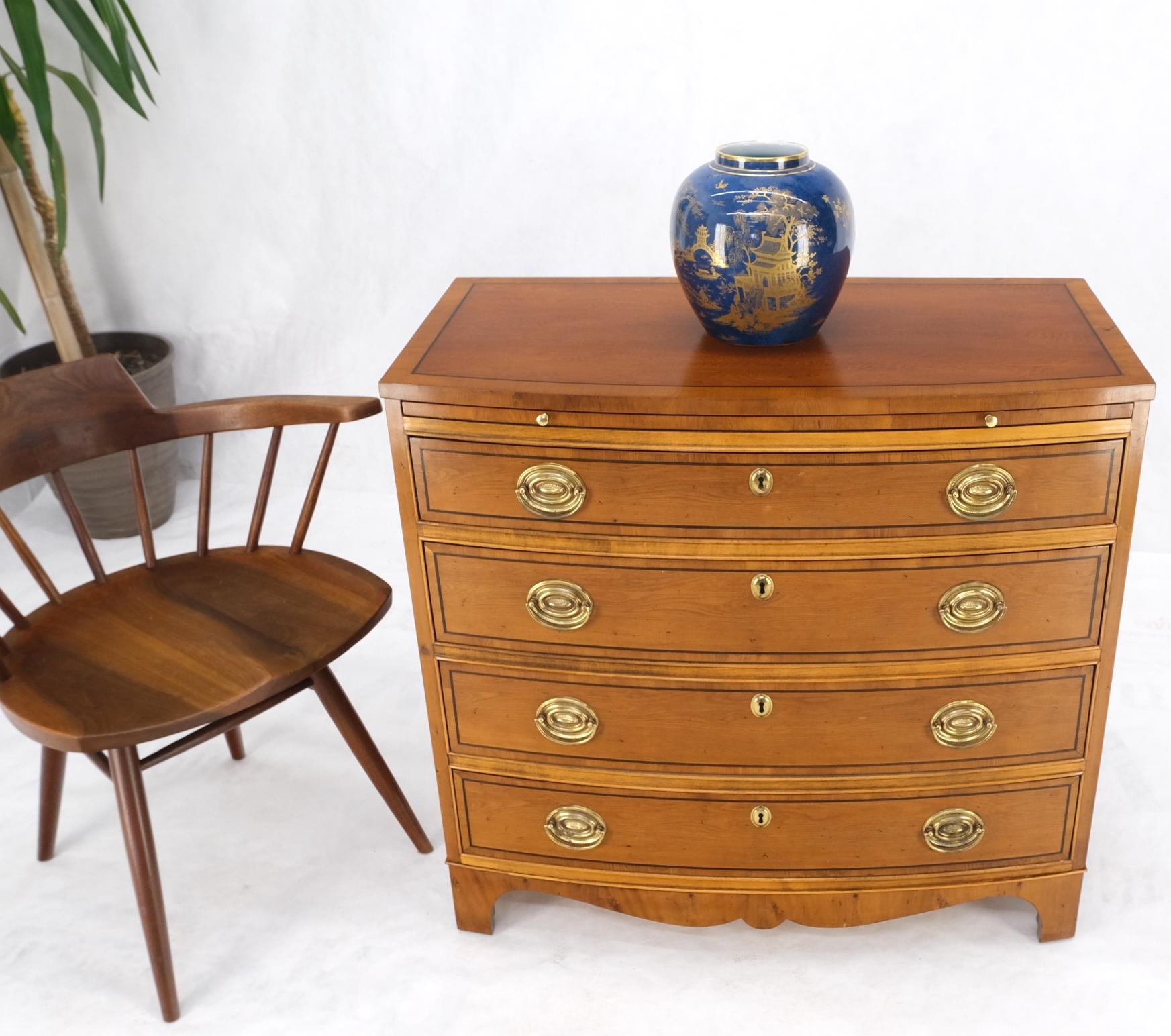 Mahogany exceptional bow front 4 drawers pull out tray brass hardware bachelor chest dresser.