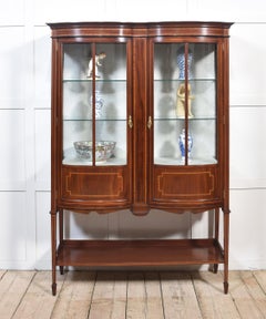 Mahogany bow front display cabinet