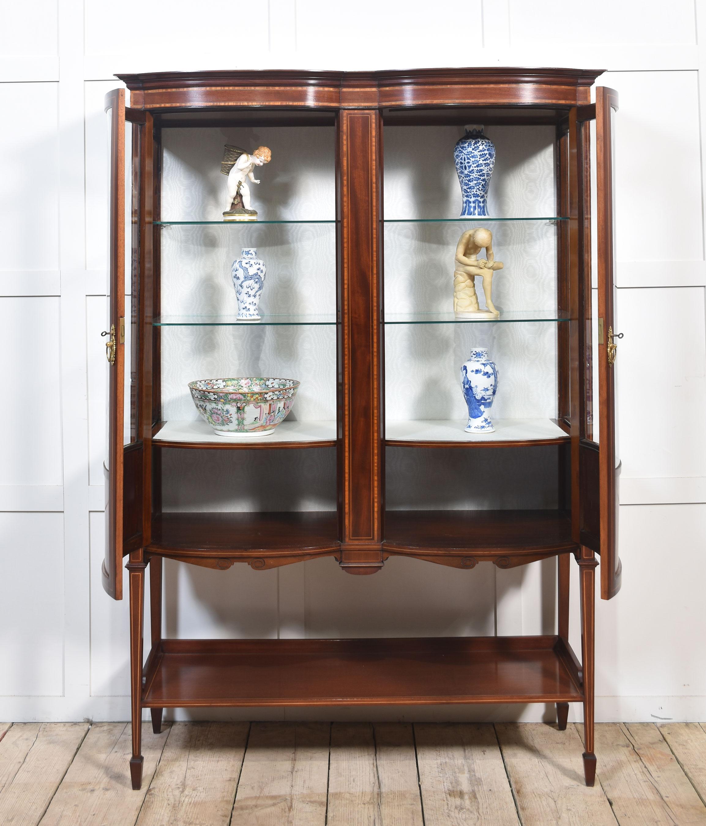 20th Century Mahogany bow front display cabinet For Sale