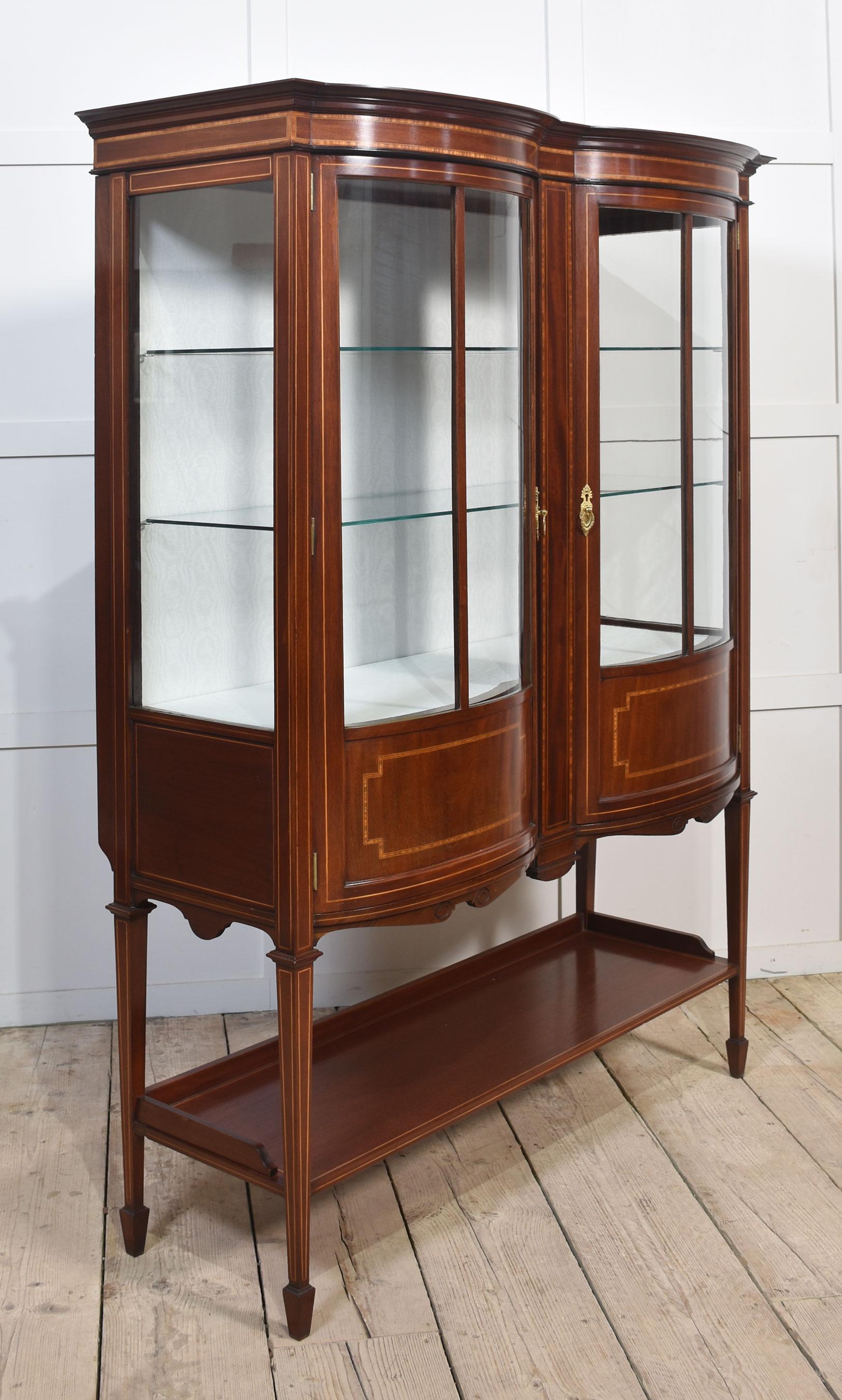Wood Mahogany bow front display cabinet For Sale