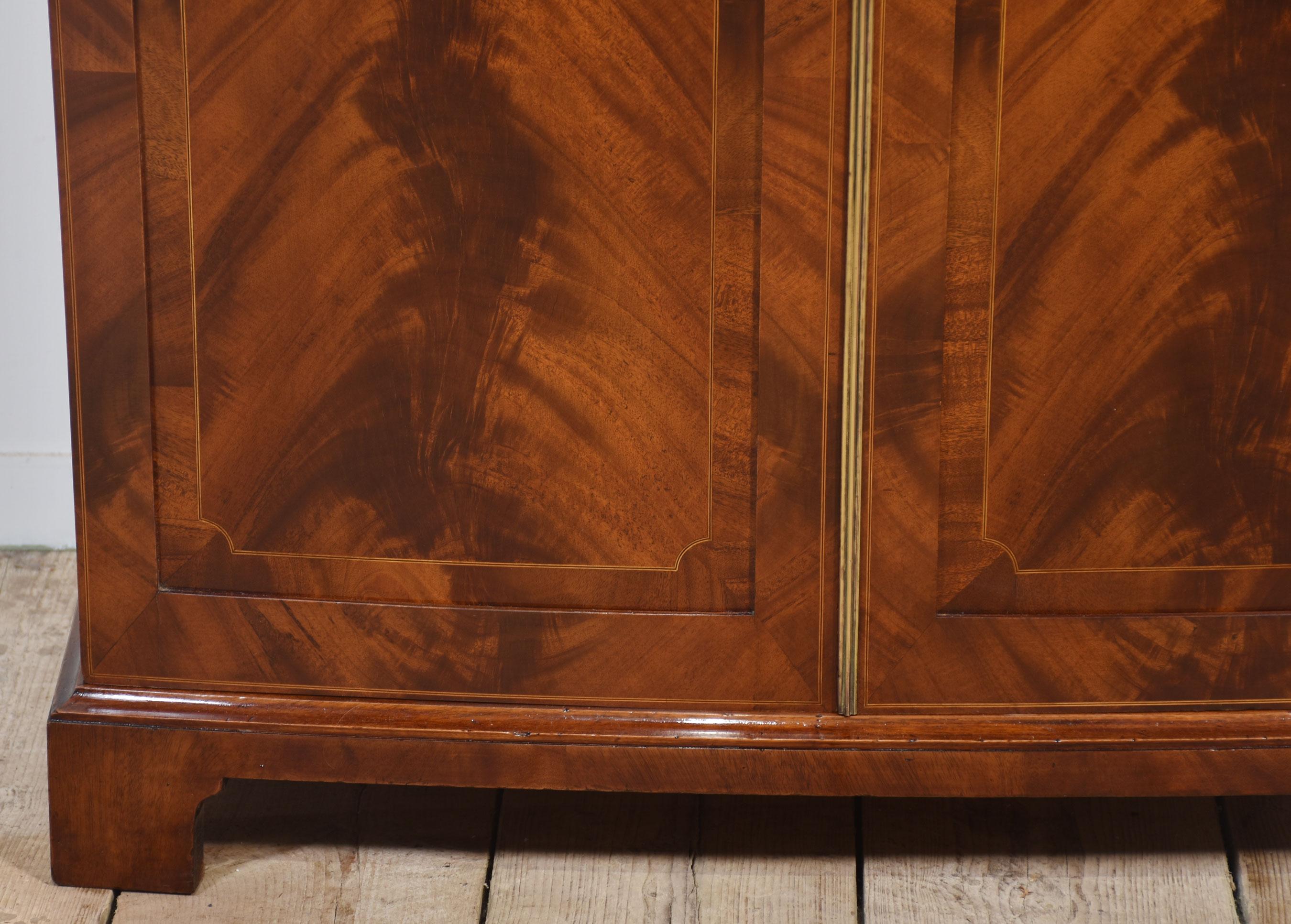 British Mahogany bow fronted two door wardrobe