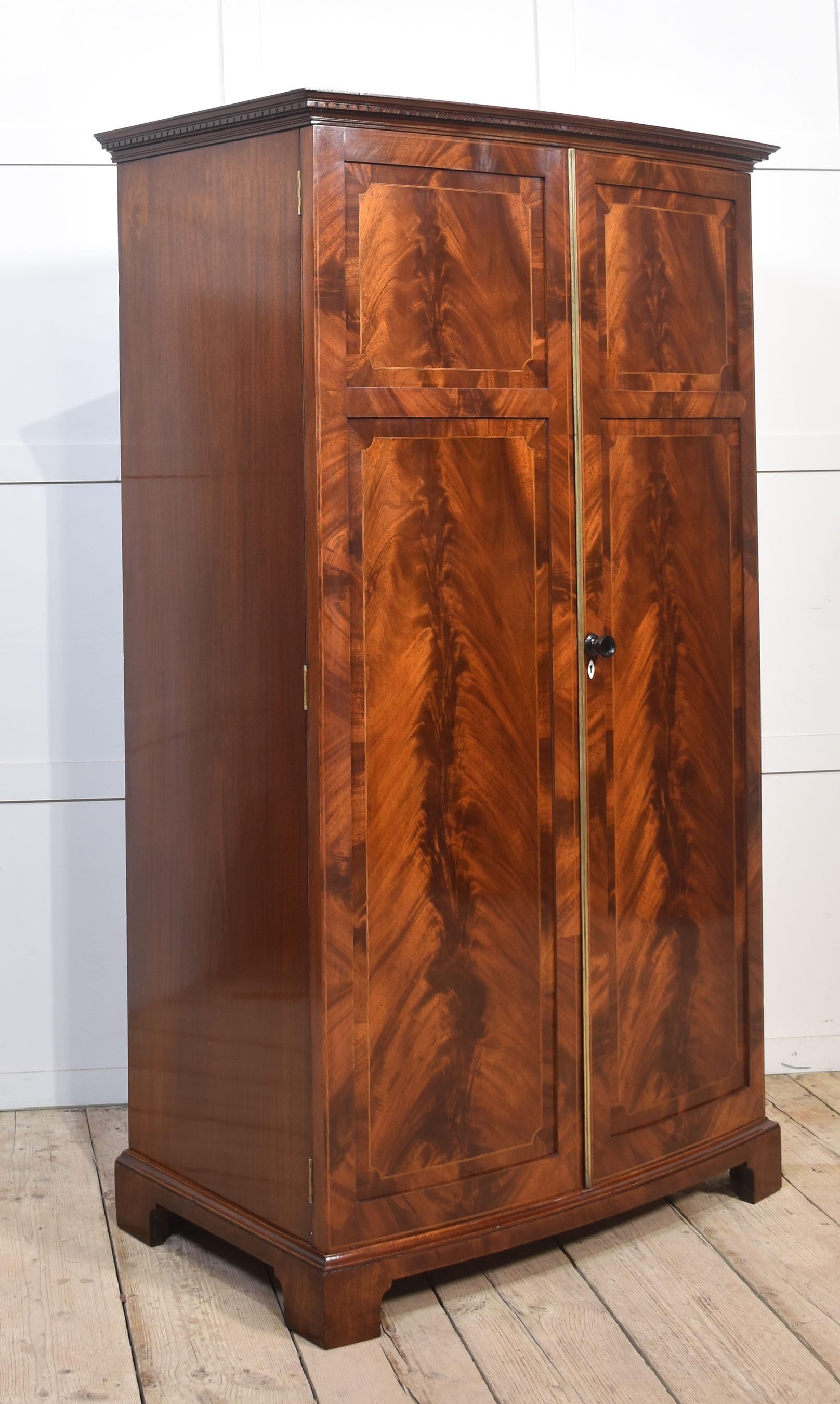 Wood Mahogany bow fronted two door wardrobe