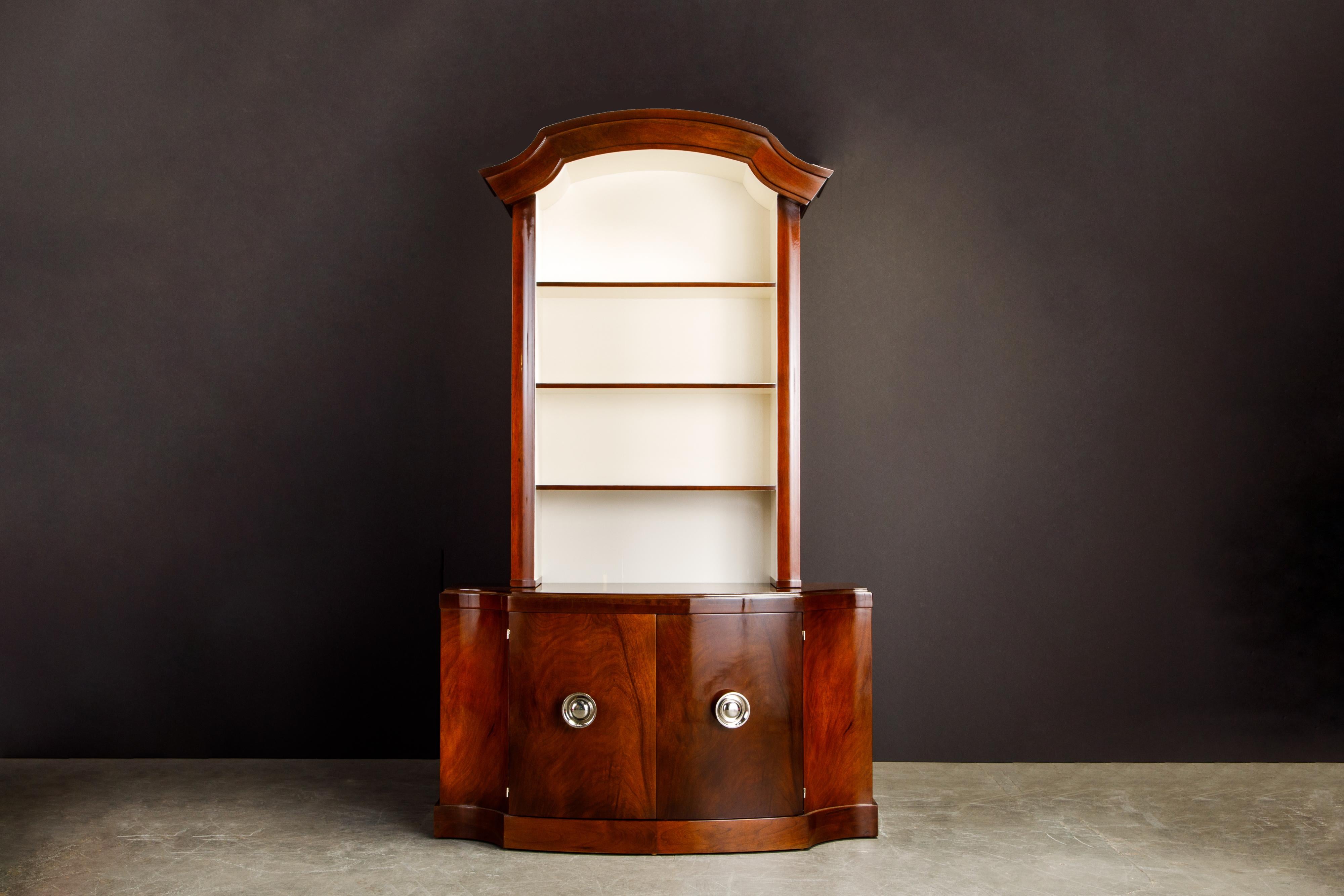 This fantastic 1940s breakfront cabinet was designed by Paul Frankl for Johnson Furniture and retailed by John Stuart. Crafted from Mahogany and newly refinished in a beautiful French Polish which is the highest costing and most laborious finish you