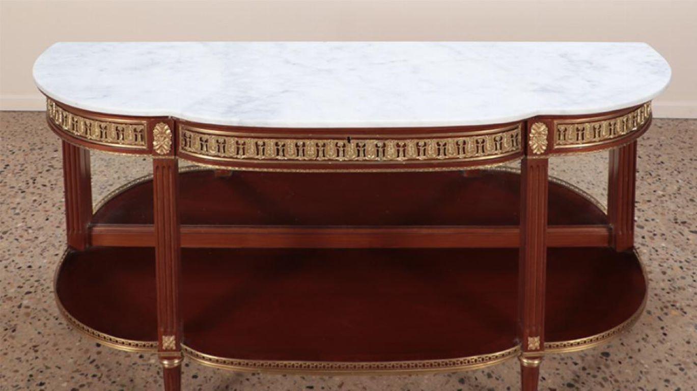 Mahogany bronze mounted Louis XVI style marble top console table In Good Condition For Sale In Philadelphia, PA