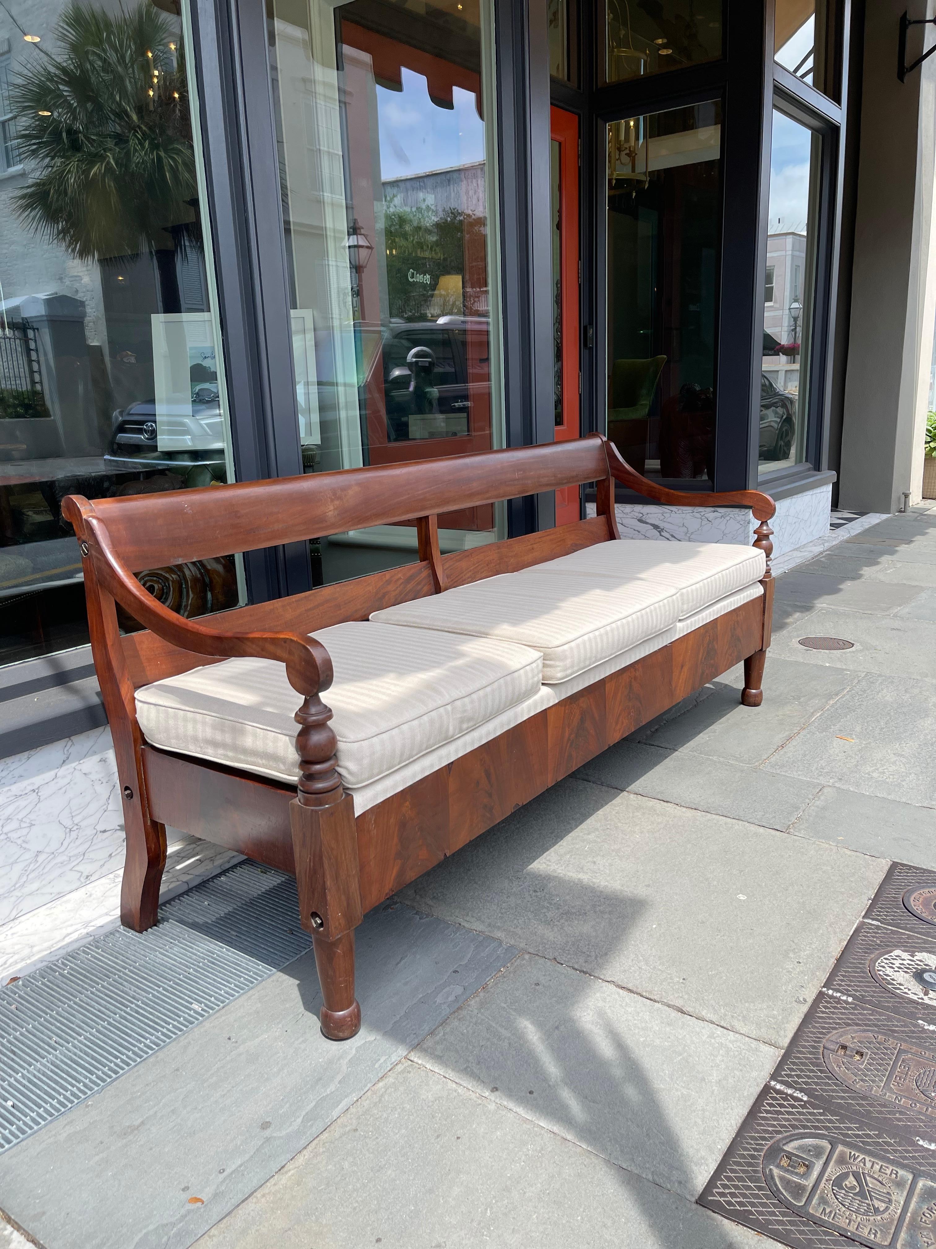 Campaign style sofa or daybed. Easily disassembled to break down for traveling.