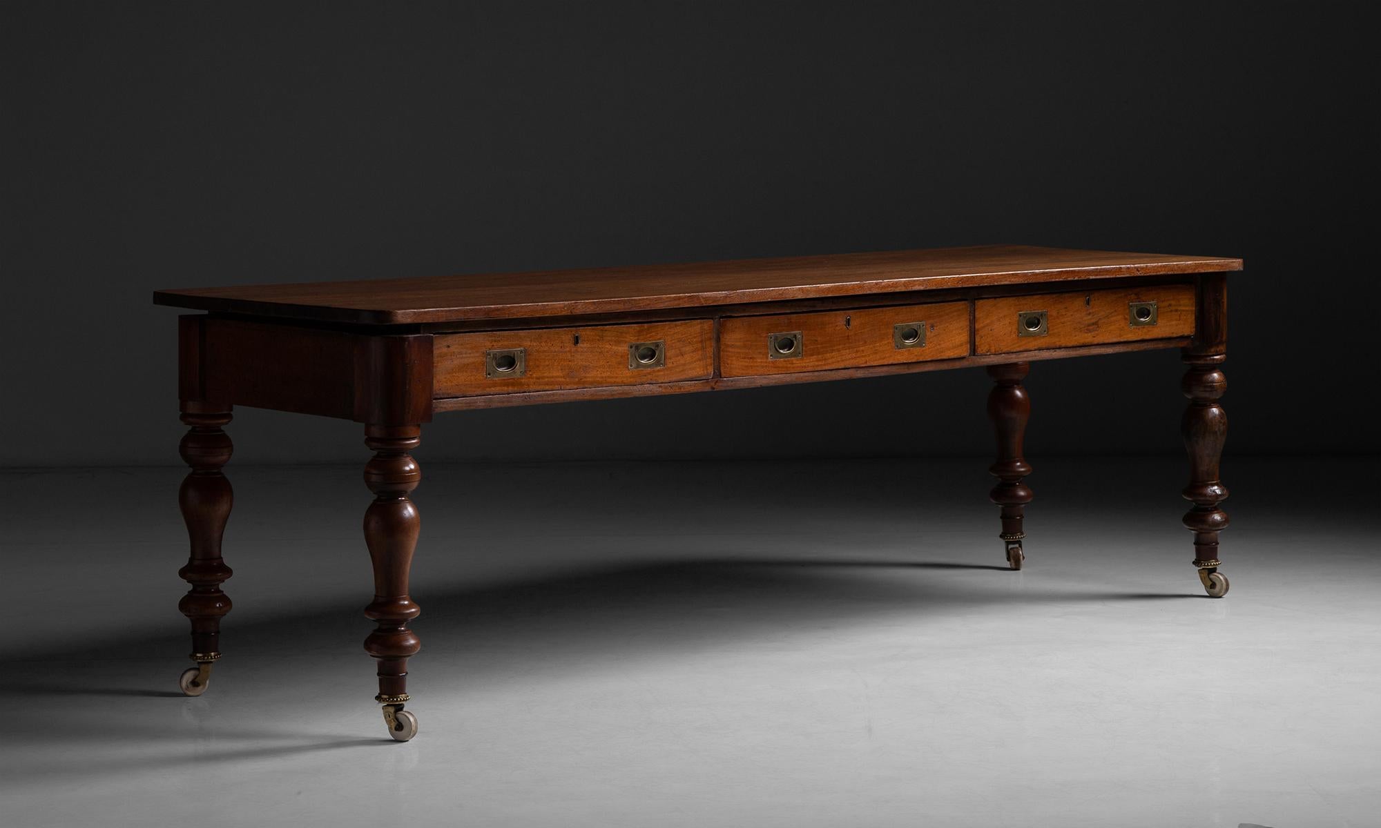 Mahogany Campaign Table, England, circa 1860

Collapsible campaign table with original brass hardware

Measures 101”L x 31”d x 32.75”h