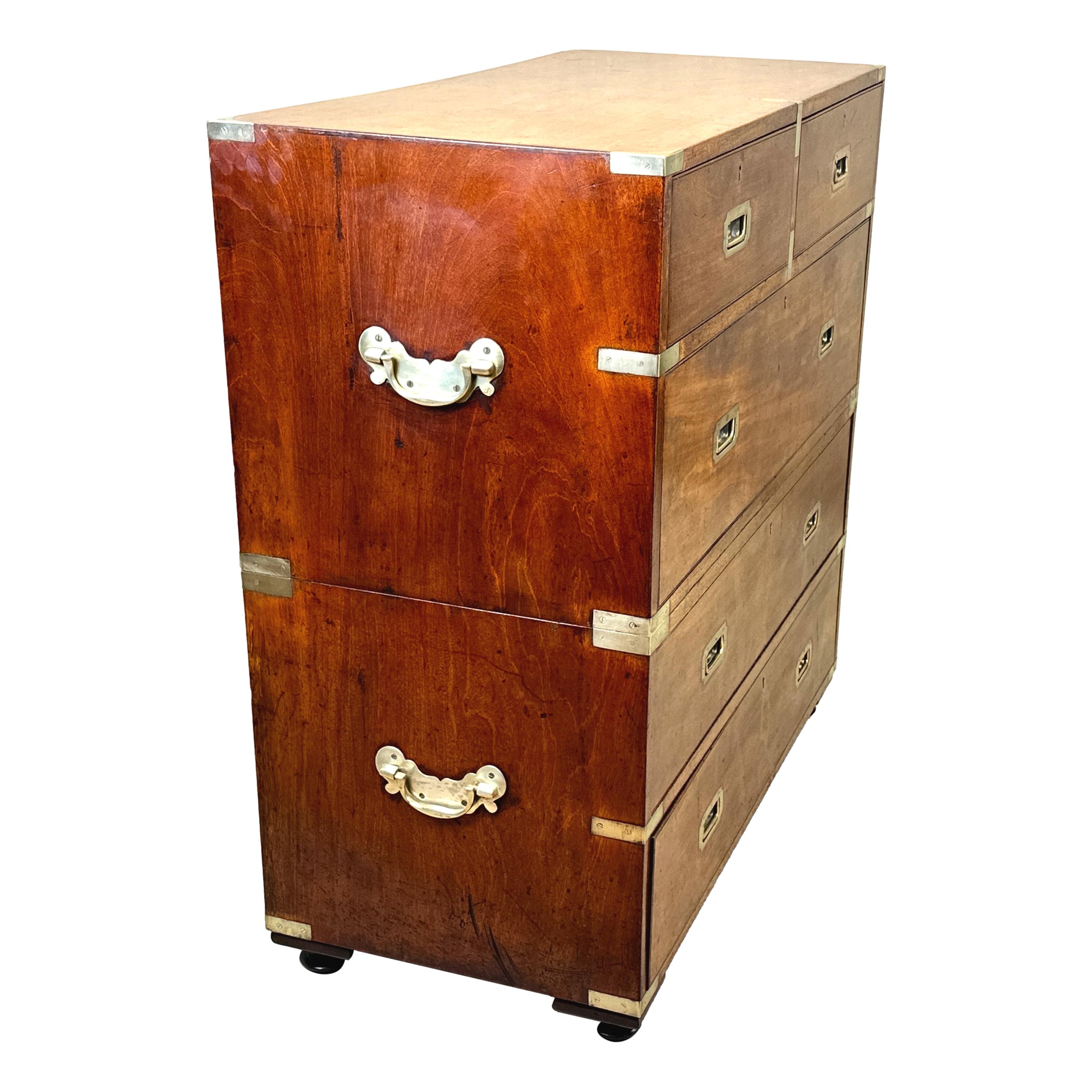 A very good quality Mid-19th Century Mahogany and camphor wood, military campaign chest, having original brass bound decoration to corners and original flush fitted brass handles to five drawers, flanked by original brass carrying handles to each