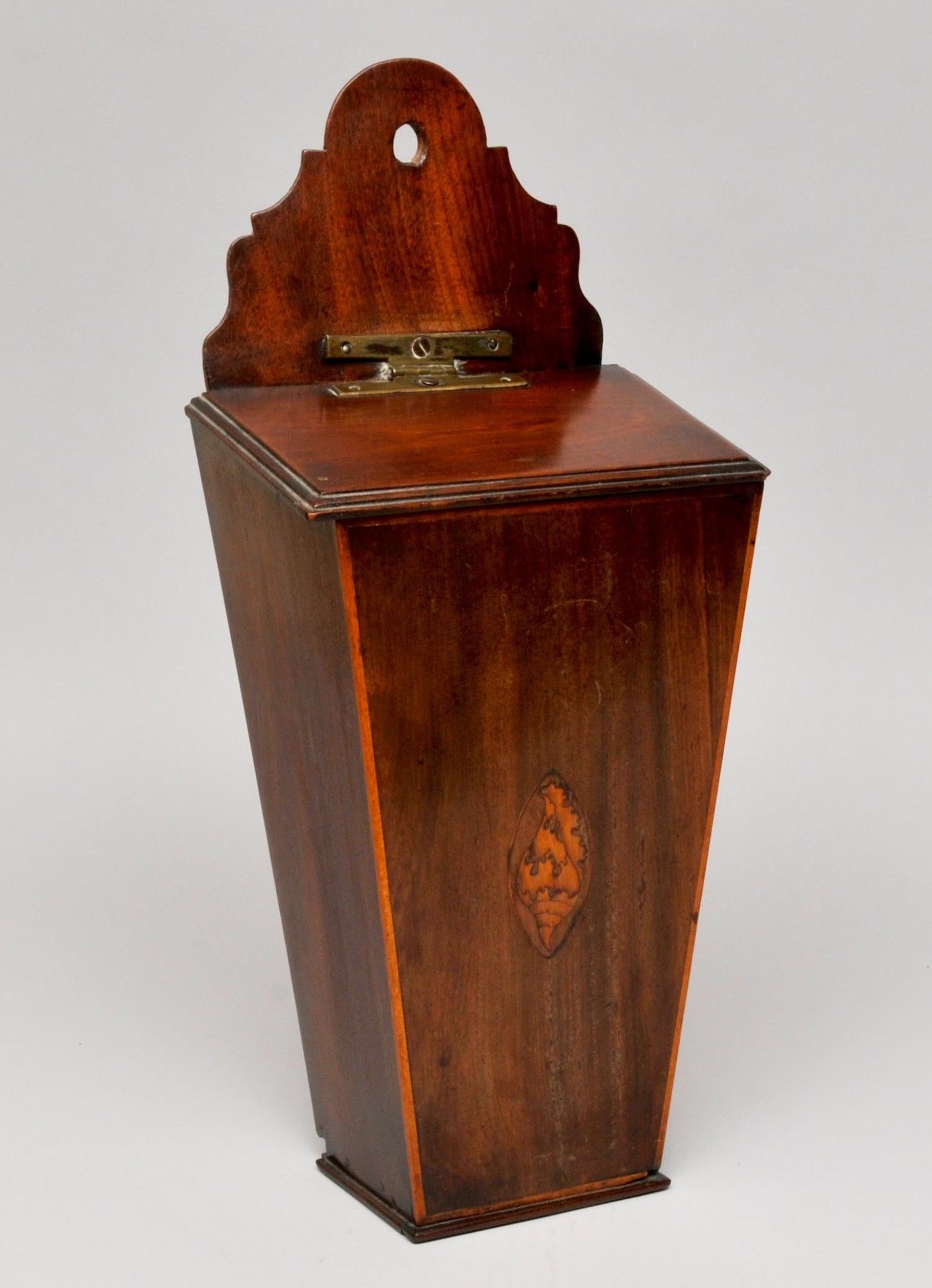 Candle box, circa 1790

Measures: H 46cm, W 21cm, D 14cm 

An interesting mahogany candle box with shell inlay detail on the front and lovely brass hinge. In excellent condition and beautiful color.