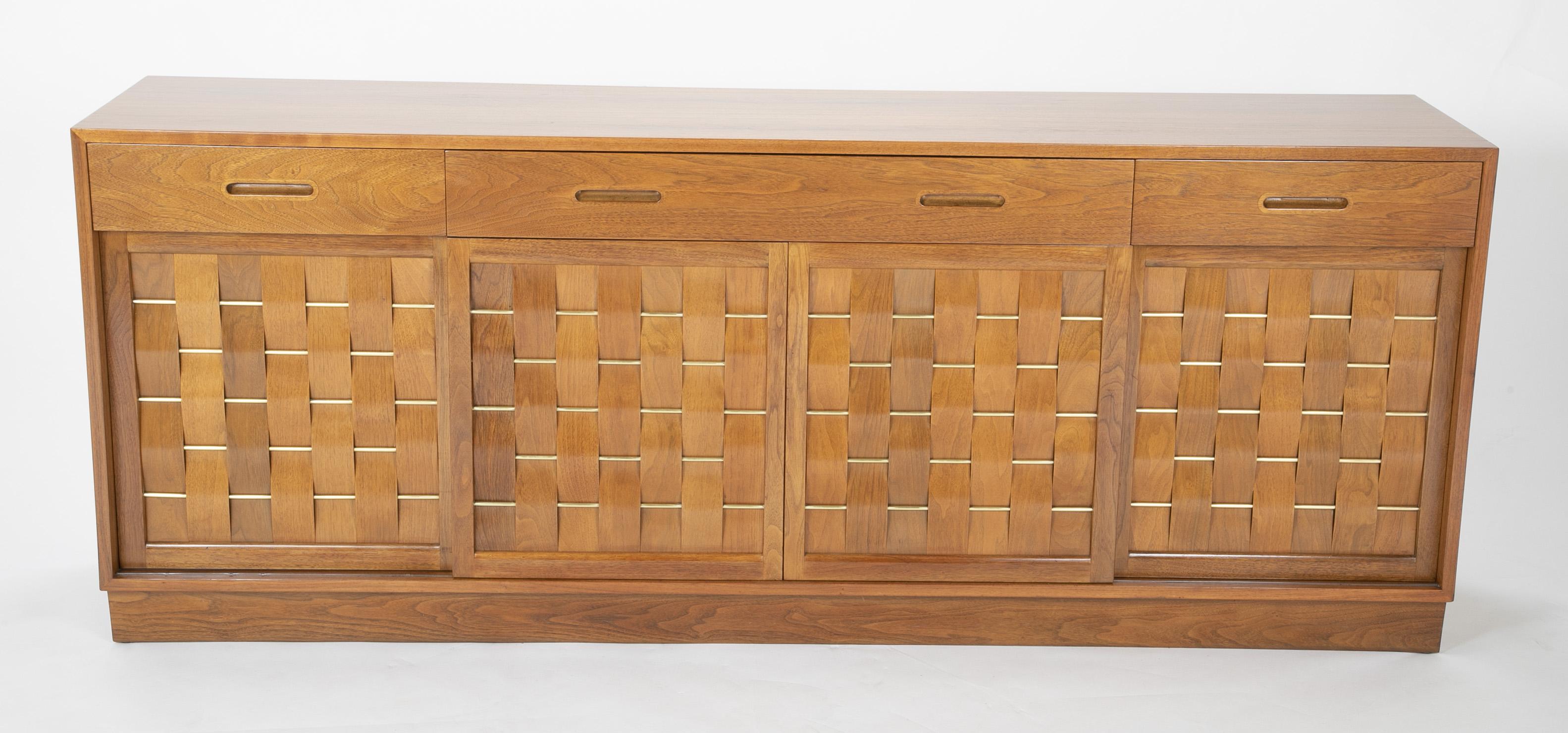 Mahogany sideboard with brass and woven mahogany doors designed by Edward Wormley for Dunbar.