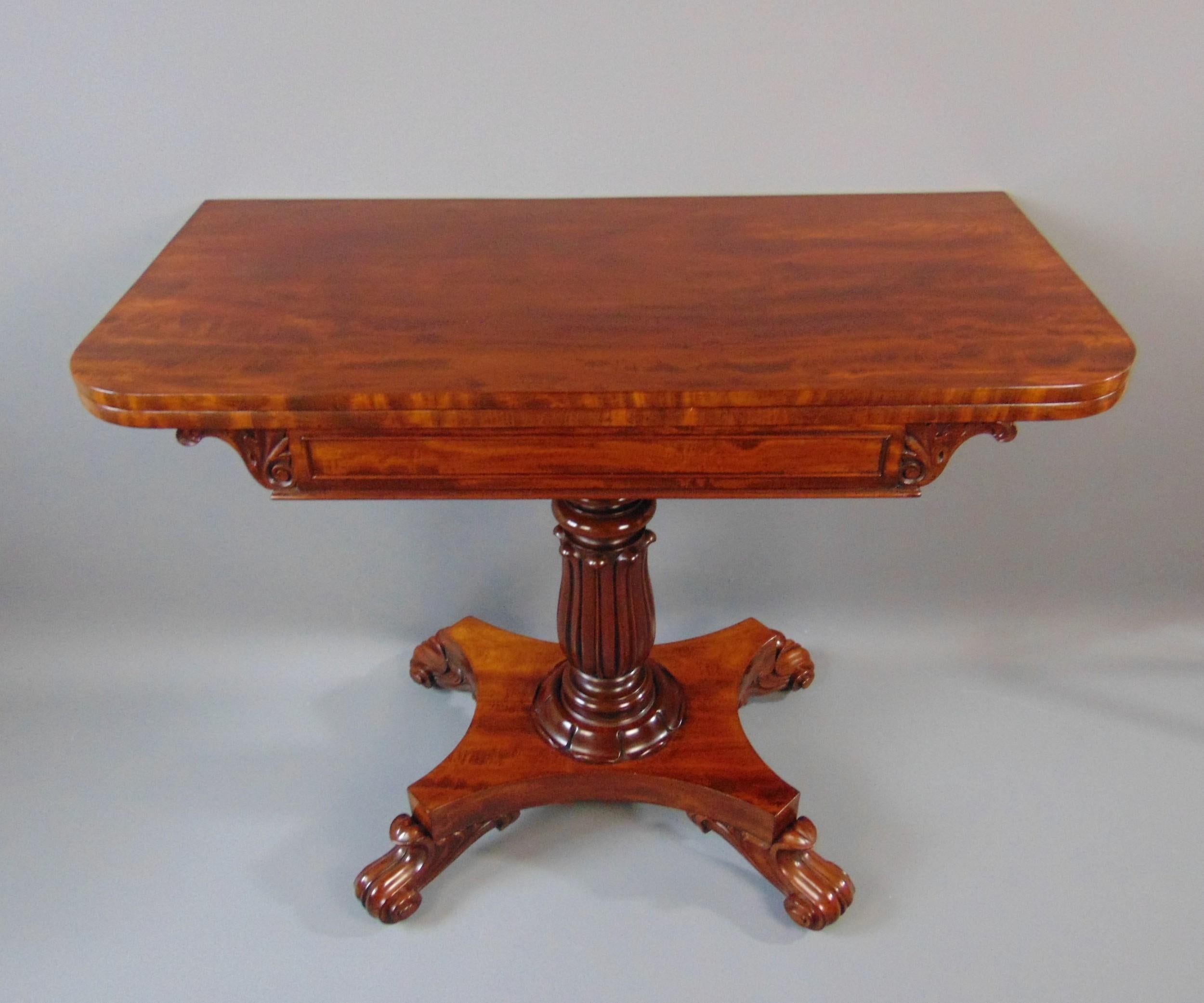Antique Mahogany William IV Mahogany  period Side Table having a fine quilted Mahogany top which opens and turns over to reveal a quality interior for use as a Tea table or Card Table on turned reeded pedestal column, standing on a shaped platform