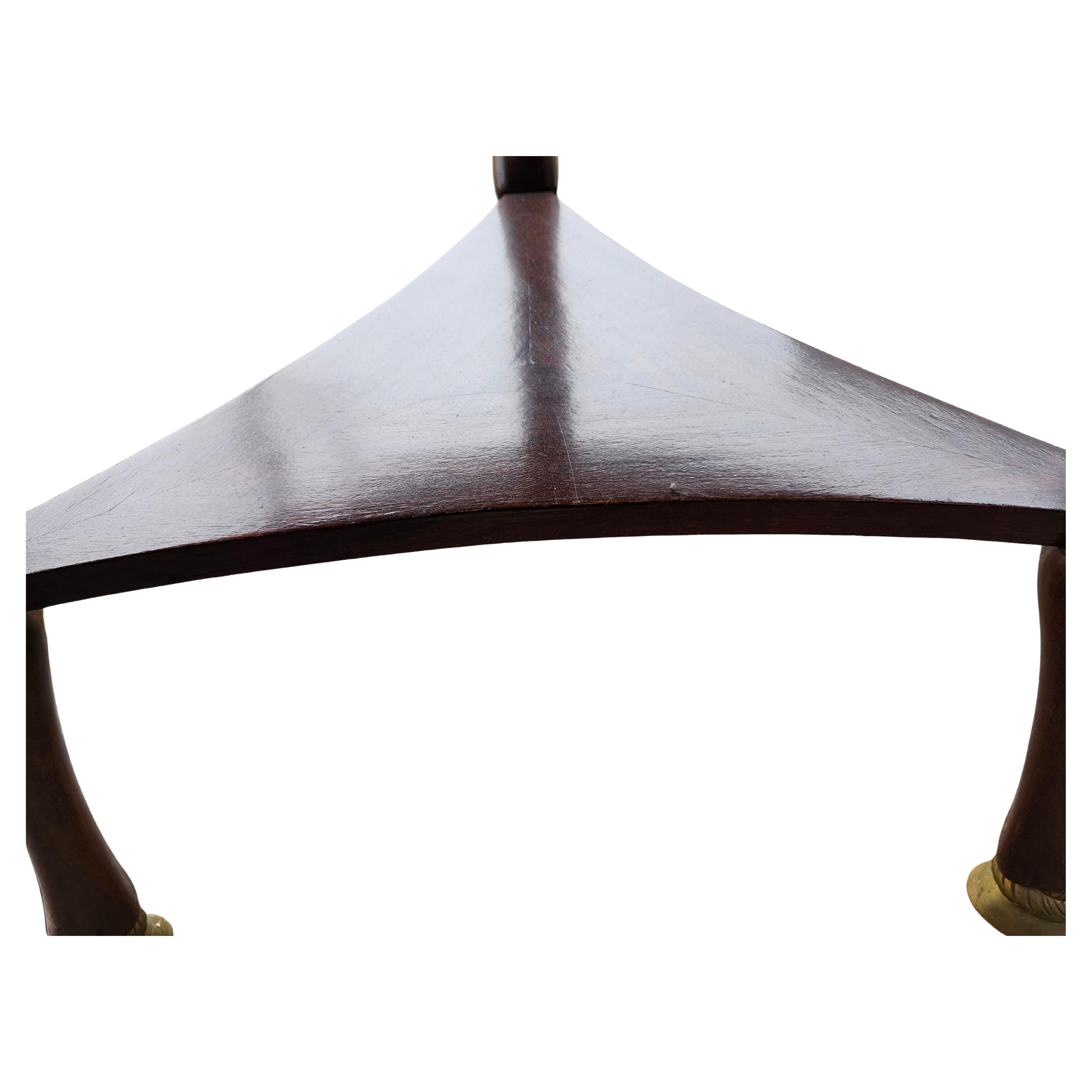 Fabulous center table in Mahogany and a carrara marble with a reticulated brass gallery. Bronze Hoof Feet with carved legs give this piece a certain elegance.  In original finish and in remarkable condition. See video & pics.