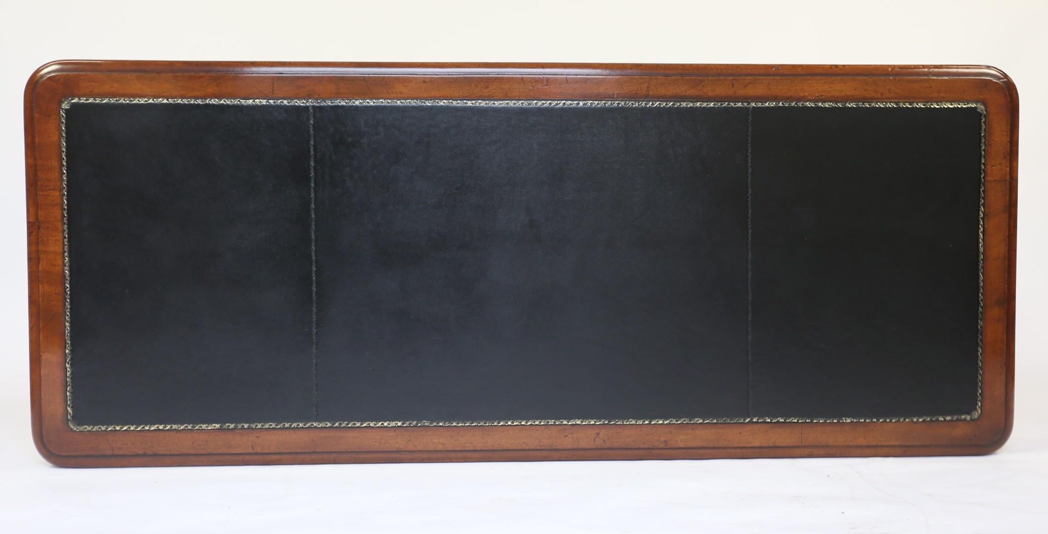 British Mahogany & carved  leather top Library table circa 1830s For Sale