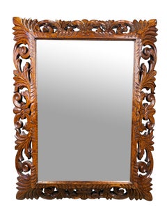 Miroir sculpté en acajou, 19ème siècle