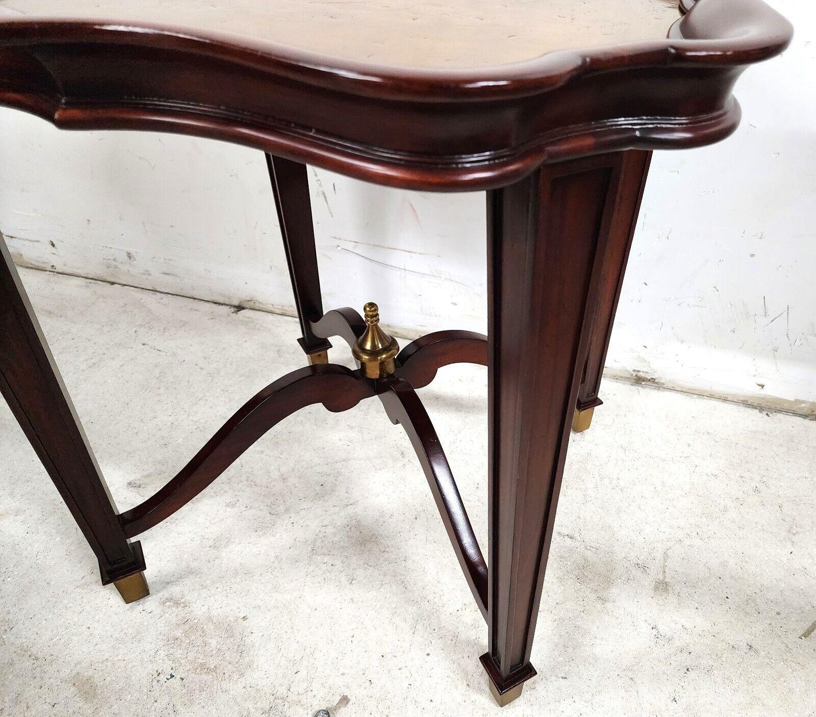 For FULL item description click on CONTINUE READING at the bottom of this page.

Offering One Of Our Recent Palm Beach Estate Fine Furniture Acquisitions Of A
Mahogany Center Side Table Brass Pie Crust Top by JD Young & Sons
Beautiful solid Mahogany