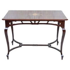 Art Nouveau Mahogany Center Table From the Early 20th Century with Floral Inlays