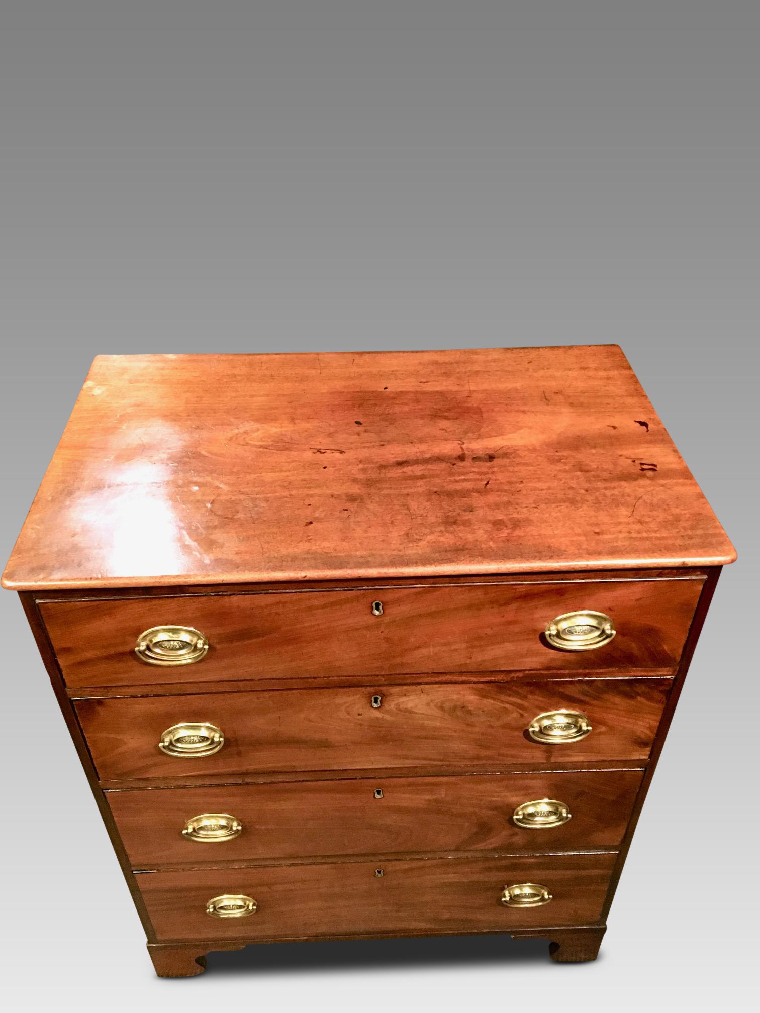 Attractive early 19th century English chest of drawers of small size, circa 1830.
This delightful chest has been well cared for by former owners. There are 4 smoothly
running drawers with oval period handles and a fine ebony beading around the