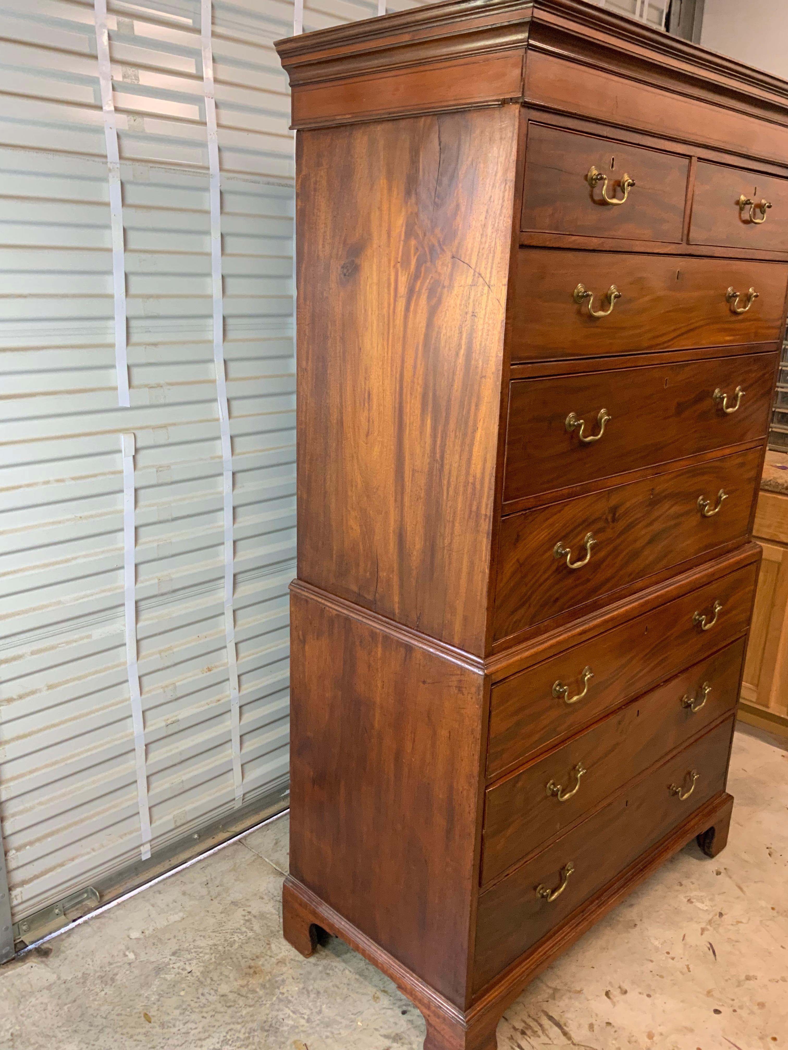 A nice clean Georgian Mahogany chest on chest. Solid Mahogany case with Pine and Oak secondary woods. Very nice mellow color and aged patina to the old finished surface. This is one of the cleanest chest on chests we’ve ever had. All drawers working