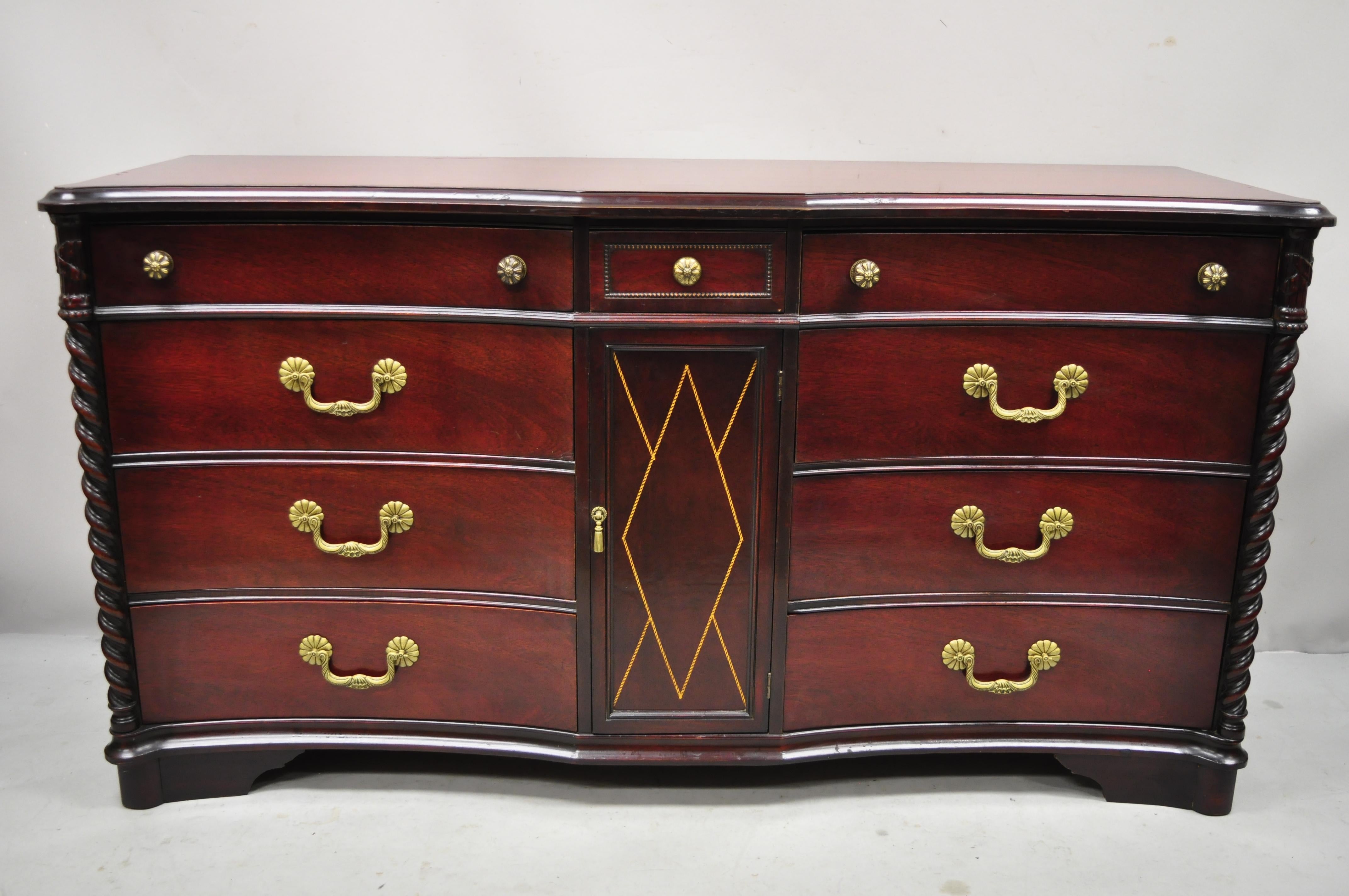 Antique Mahogany Chinese Chippendale long dresser credenza with tooled leather door front. Item features custom glass top included, tooled leather door front, beautiful wood grain, nicely carved details, 1 swing doors, 9 dovetailed drawers, solid
