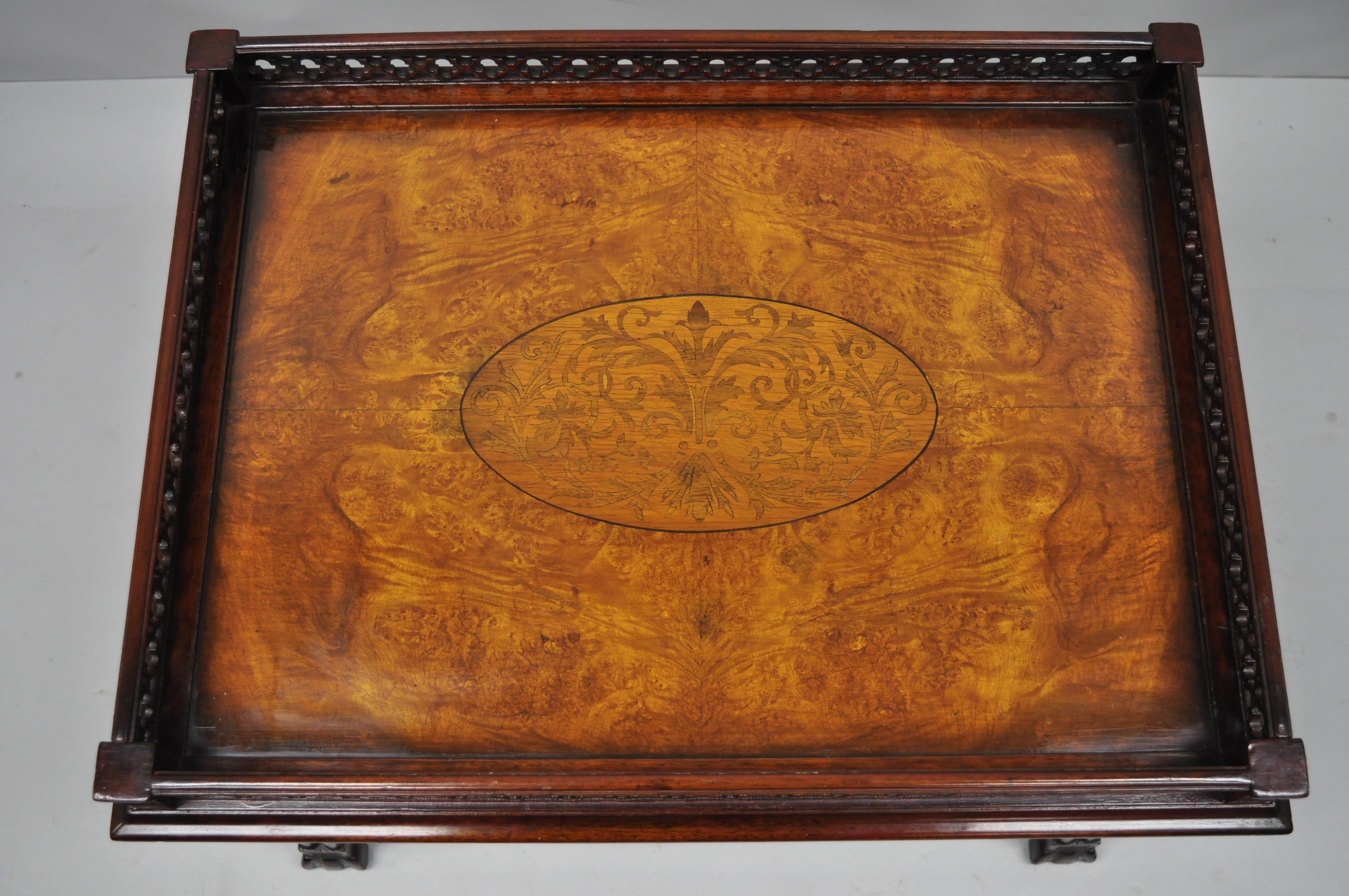 Mahogany Chinese Chippendale style burl wood inlay small coffee table. Item features pierce carved legs and fretwork gallery, stretcher support, burl wood inlaid top, beautiful wood grain, great style and form, circa mid-20th century. Measures: 20