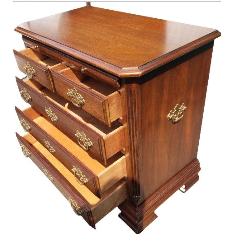 Solid Mahogany Chippendale bachelor chest of drawers. Pull out tray to make it your occasional secretary desk. 
Excellent condition.
Measures 34 W x 18 D x 31 H.
  