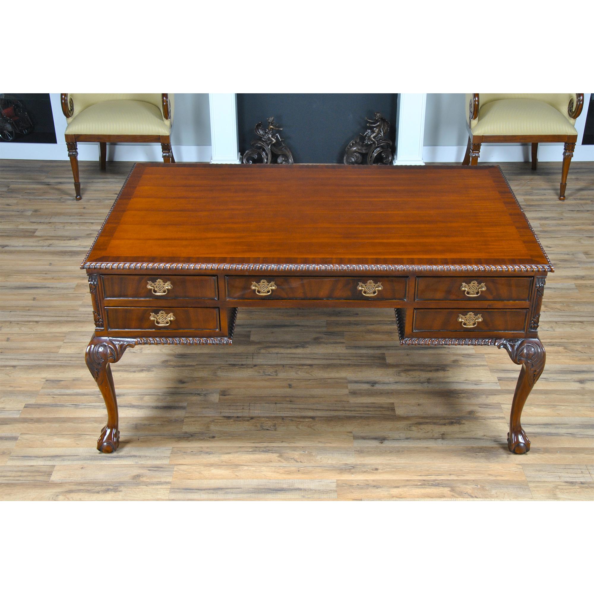 This is the Niagara Furniture version of the Mahogany Chippendale Partner Desk. It is a true partner’s desk in every sense of the phrase with an equal number of drawers on each side of the desk. This Chippendale style high quality writing desk sets