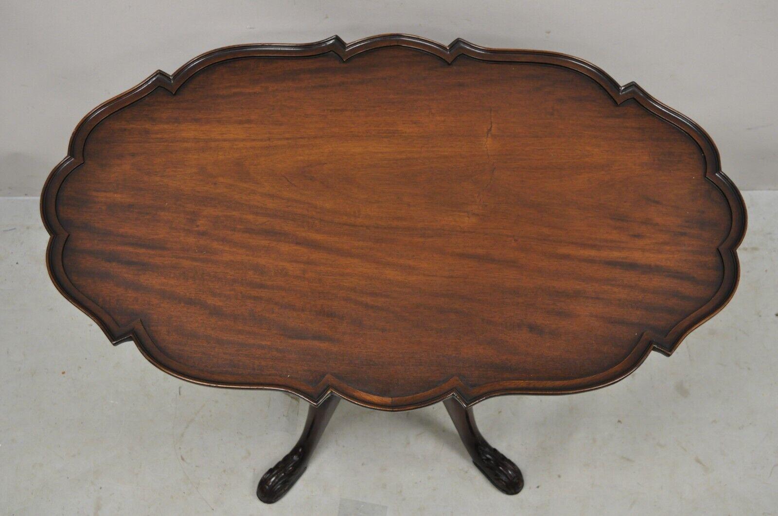 20th Century Mahogany Chippendale Style Tilt Top Pedestal Base Scalloped Oval Coffee Table