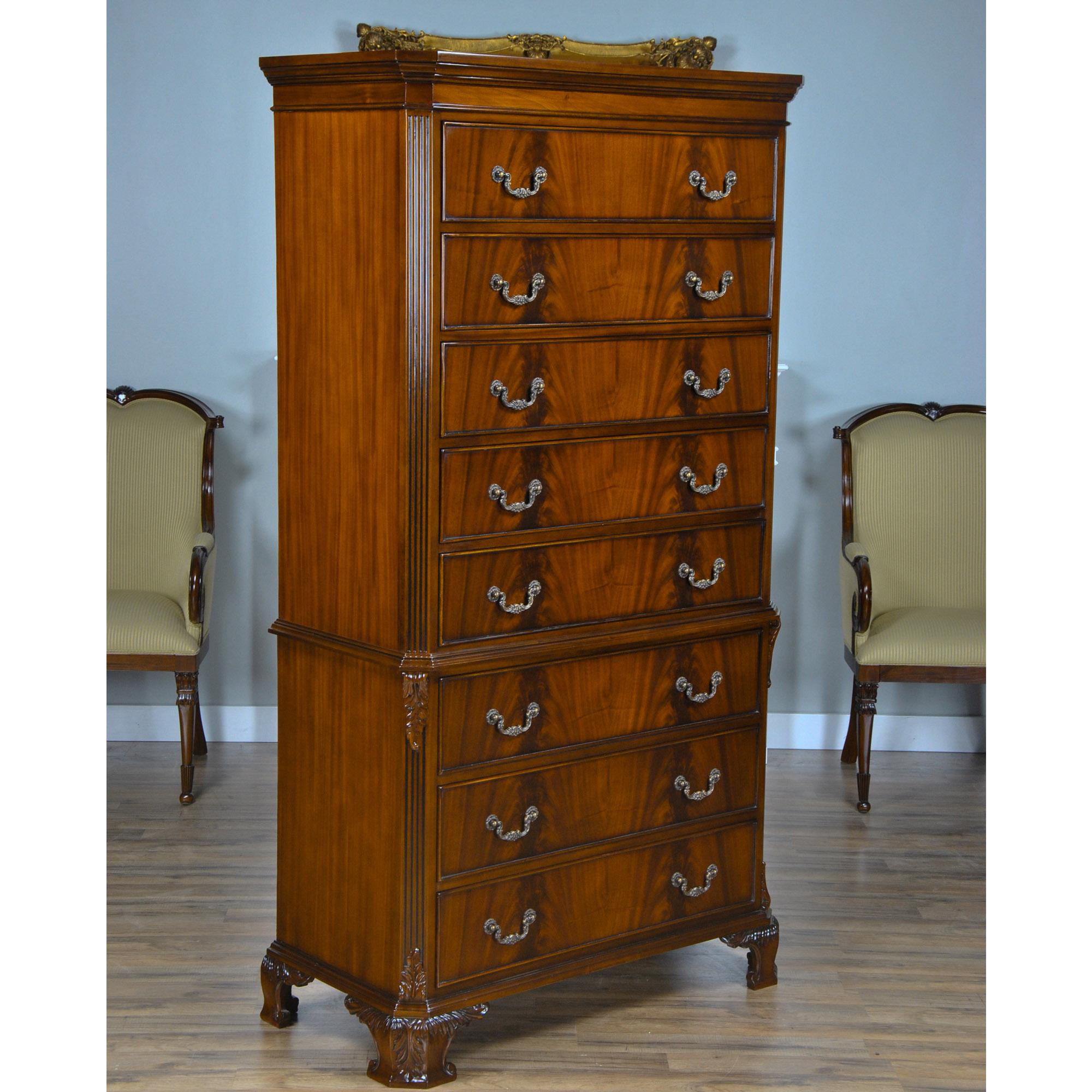 The Mahogany Chippendale Tall Chest will become the centerpiece of any room. Inspired by Chippendale design the two part construction lends elegance to any setting. Resting on hand carved, solid mahogany feet the eight drawers soar upwards to