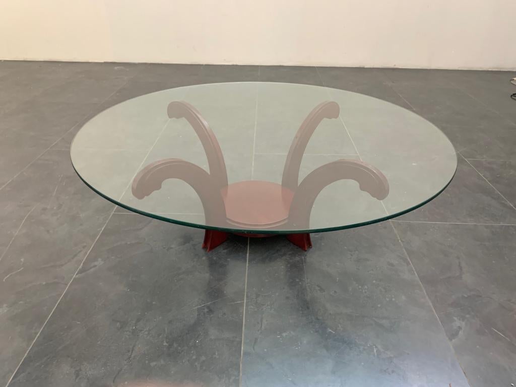Mahogany circular coffee table with crystal, 1970s.
Packaging with bubble wrap and cardboard boxes is included. If the wooden packaging is needed (crates or boxes) for US and International Shipping, it's required a separate cost (will be quoted