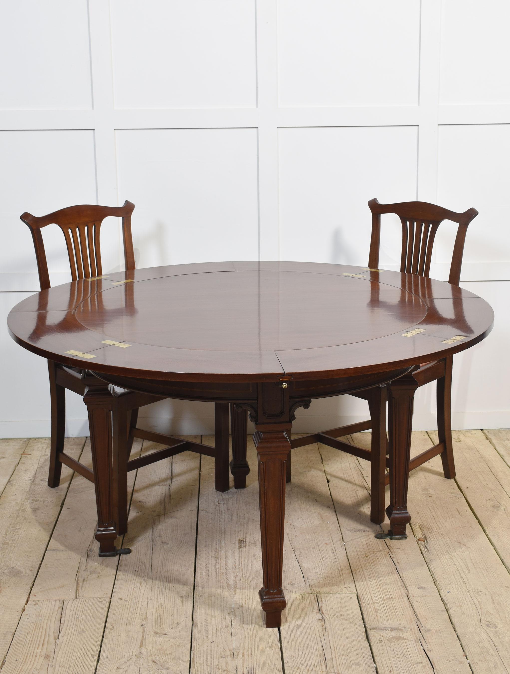 Mahogany circular extending dining table For Sale 4