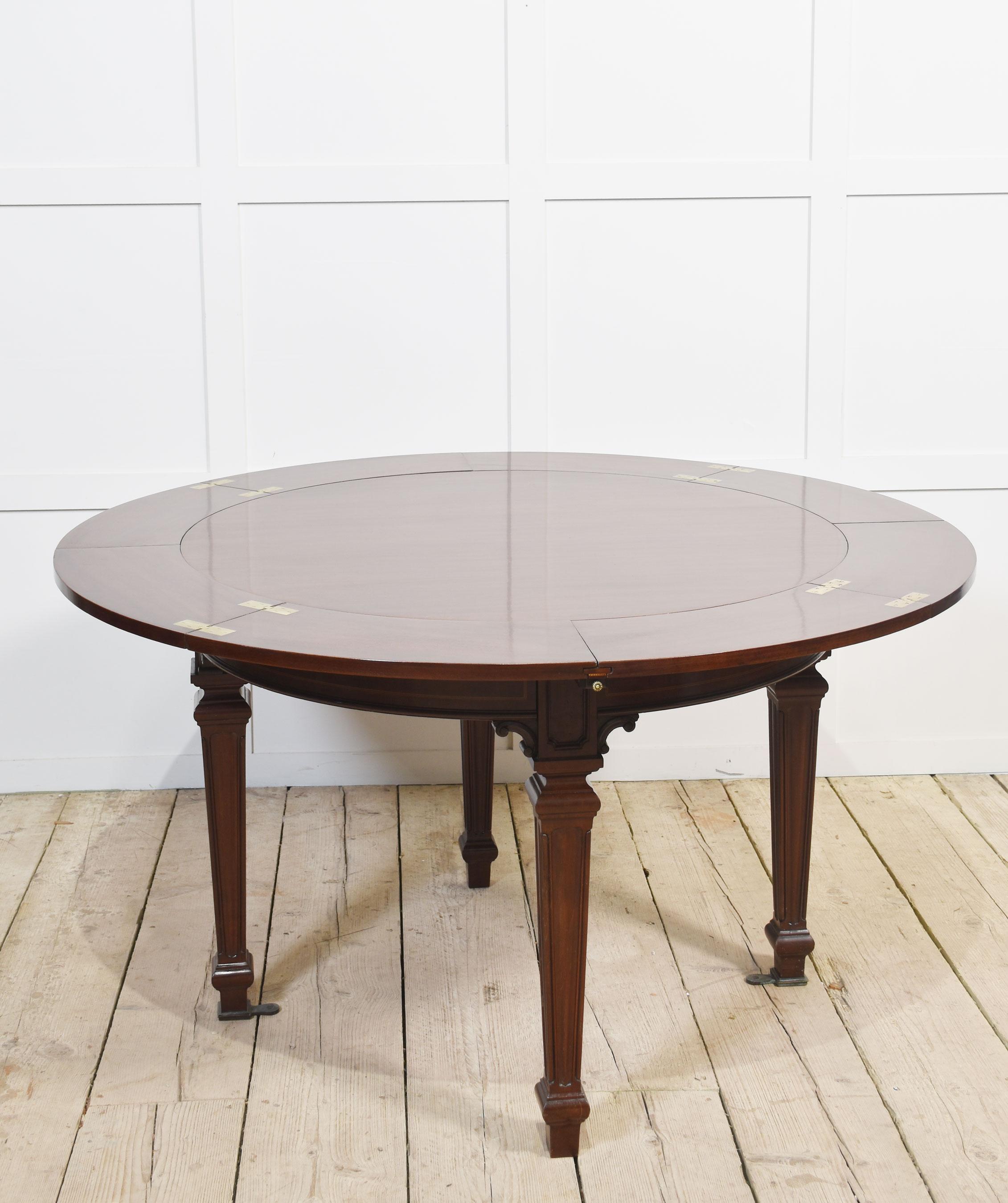 Mahogany circular extending dining table For Sale 5