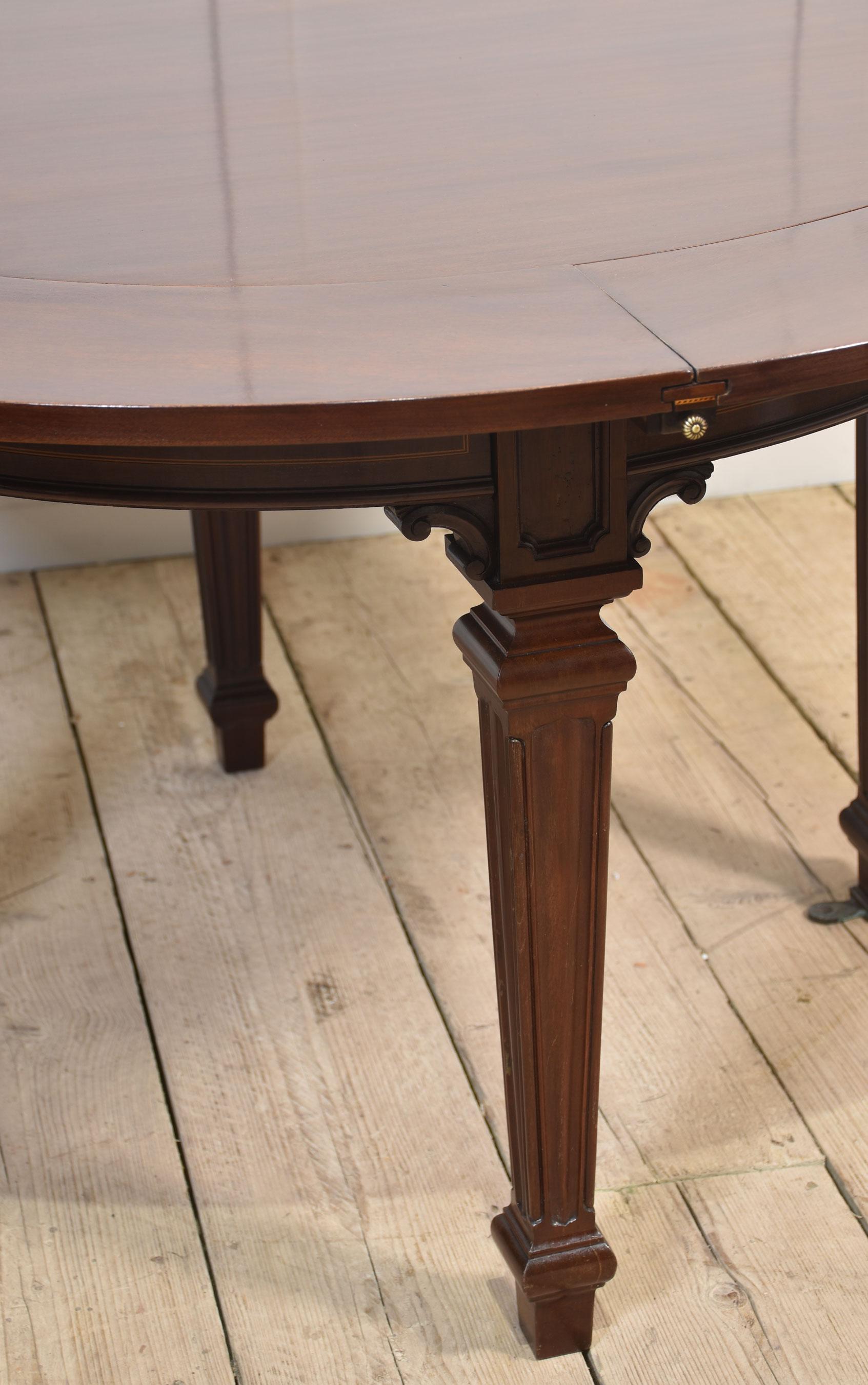 Mahogany circular extending dining table For Sale 7