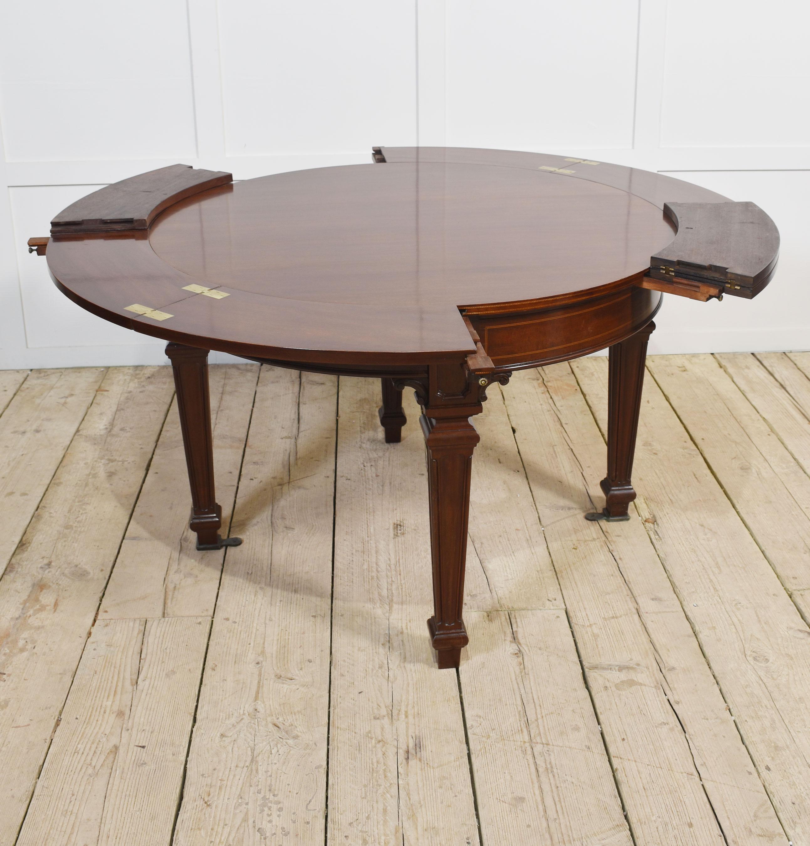 Mahogany circular extending dining table For Sale 11