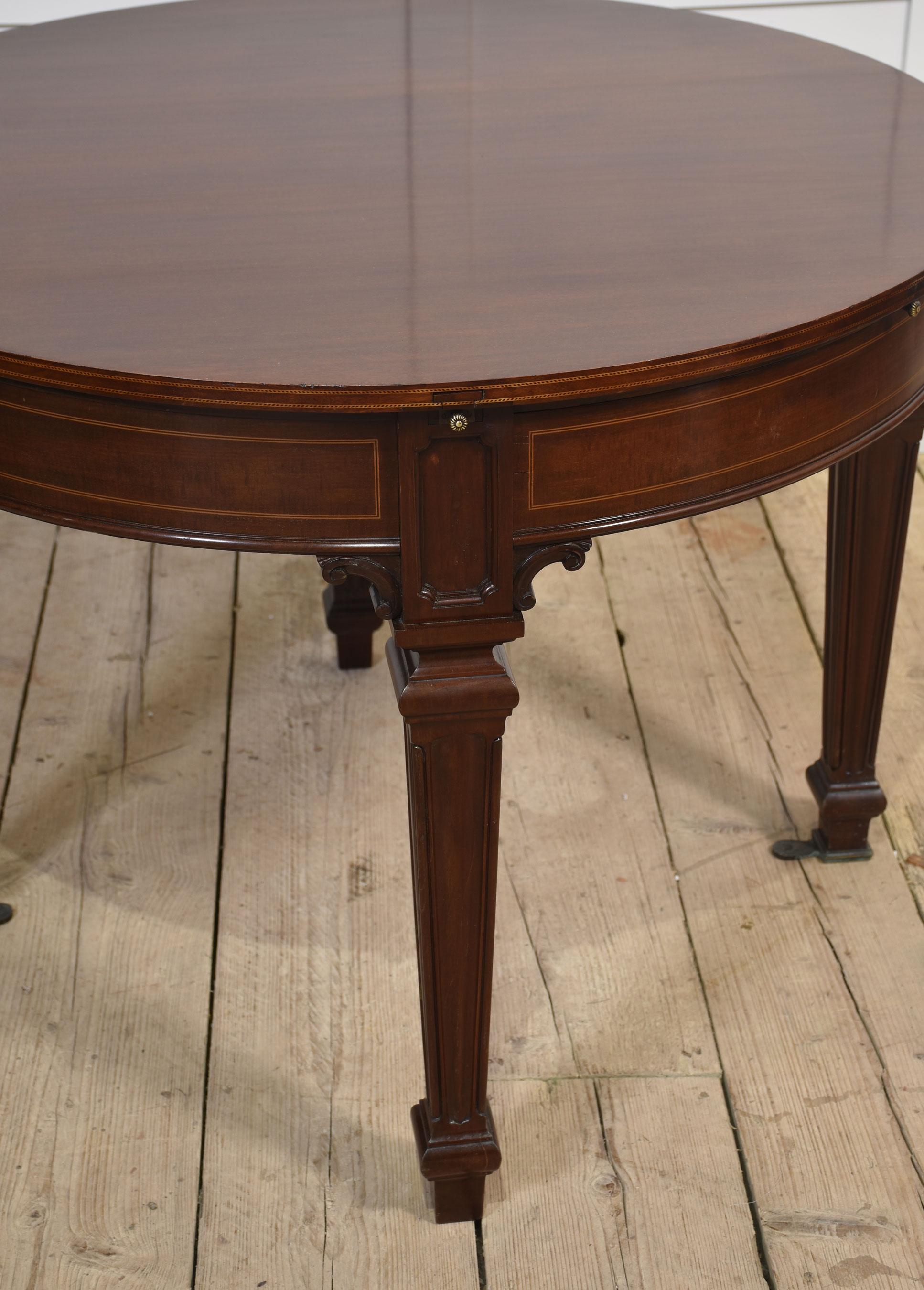Mahogany circular extending dining table For Sale 1