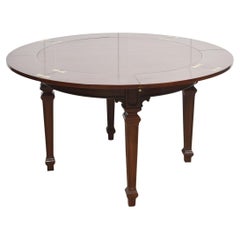 Mahogany circular extending dining table
