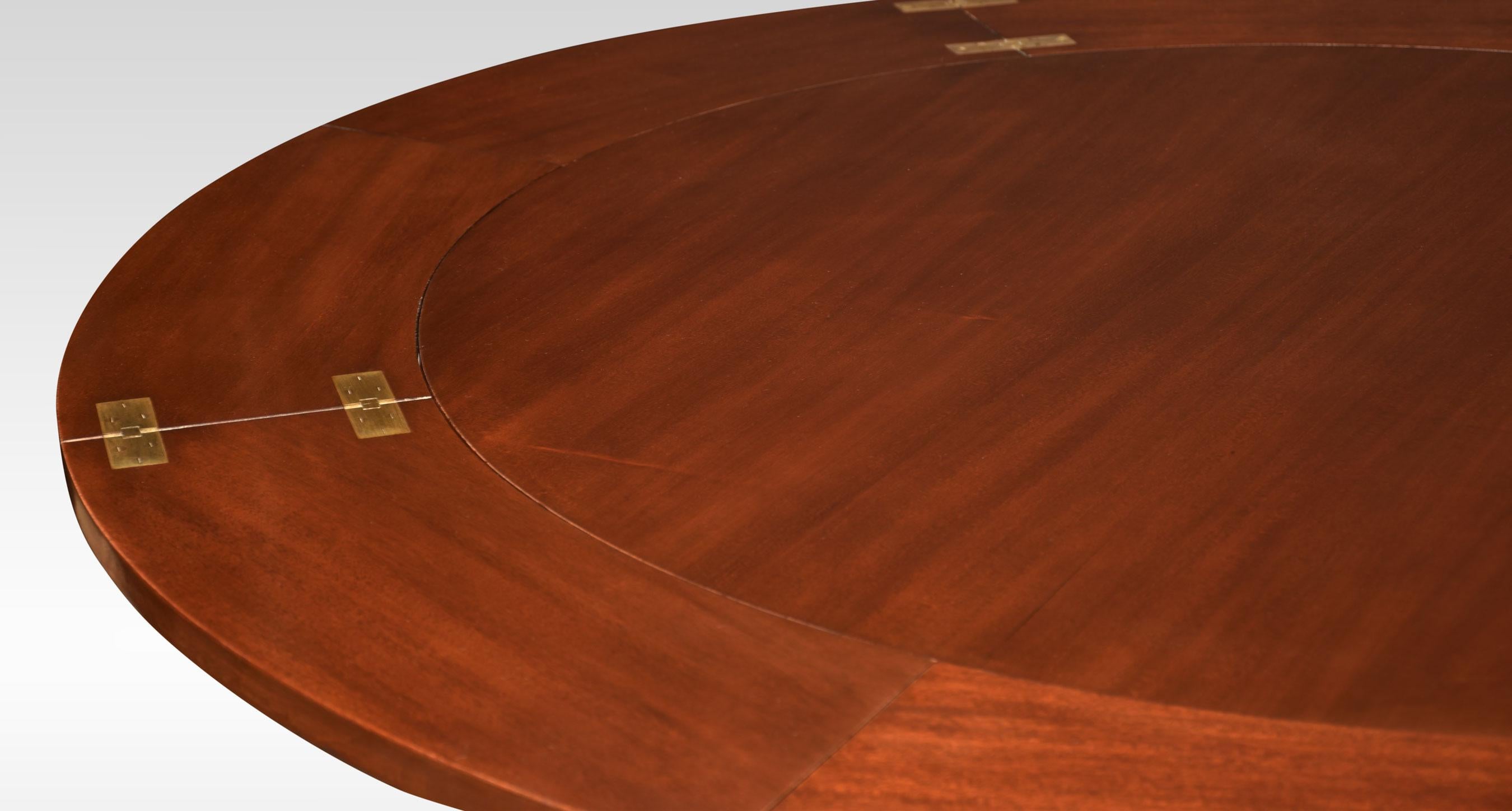British Mahogany circular extending ships dining table For Sale