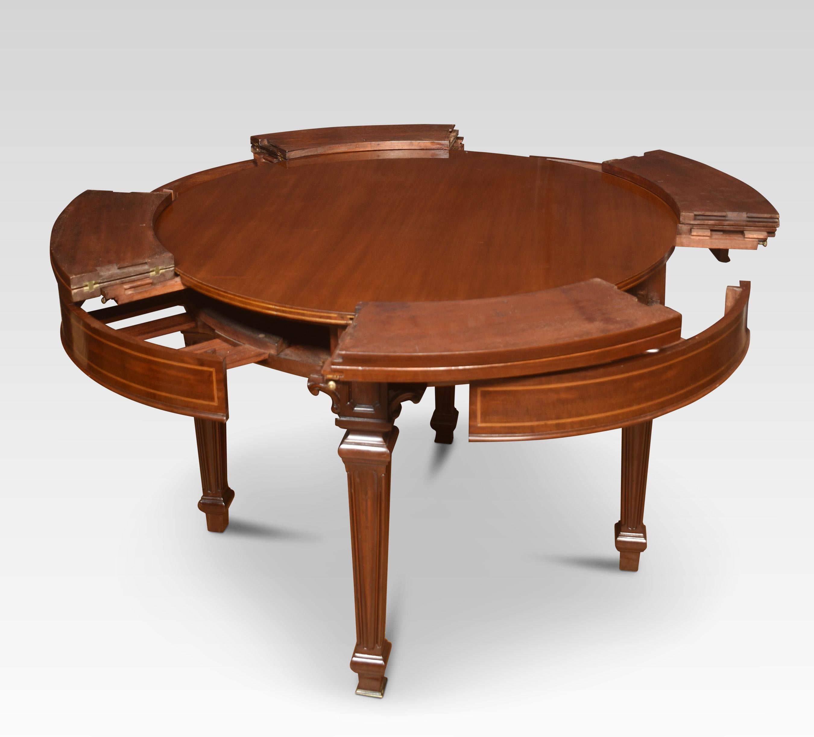 20th Century Mahogany circular extending ships dining table