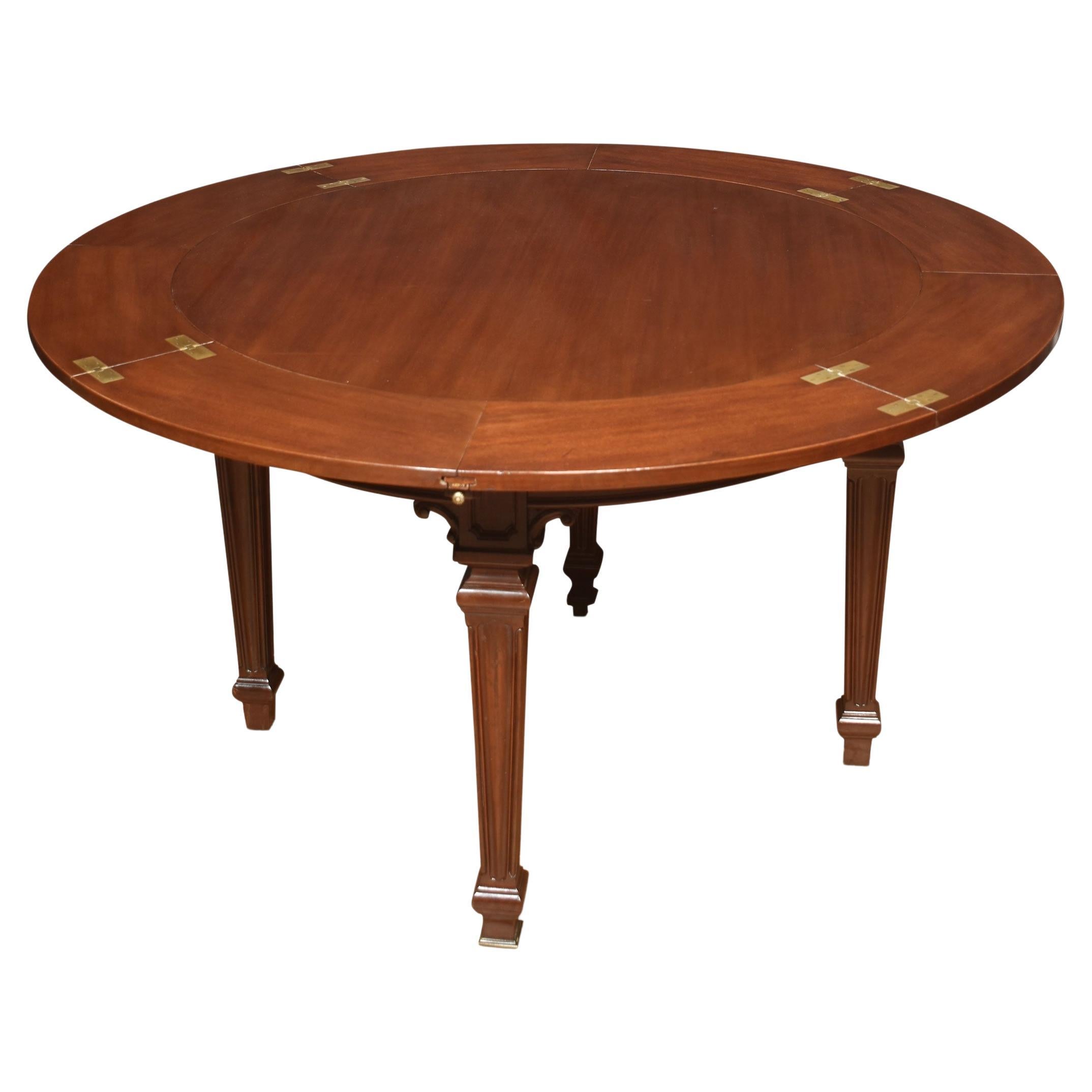 Mahogany circular extending ships dining table For Sale