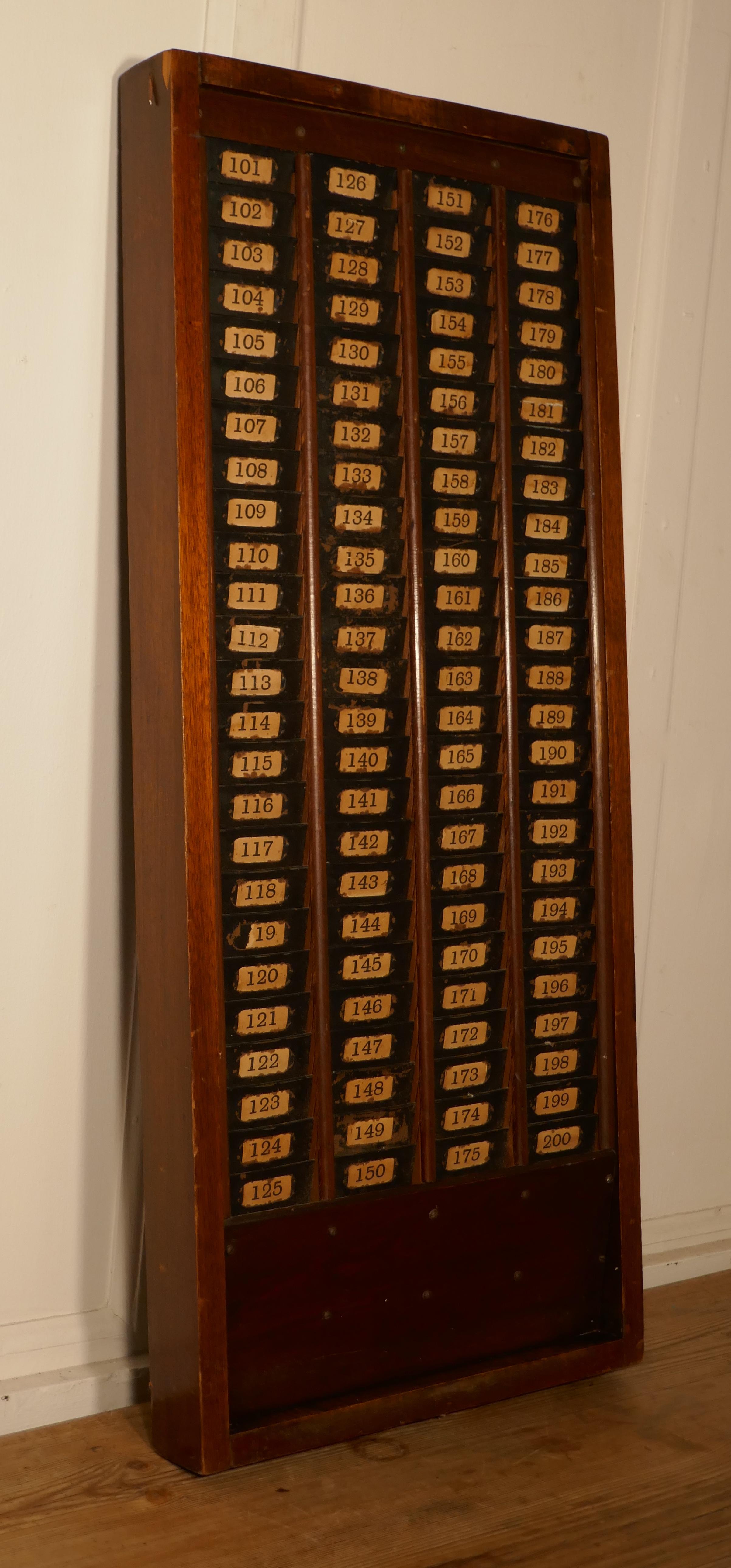 Mahogany clocking in time card rack

No longer in use but a great addition to Time Clock collectors the rack is set in a mahogany case and the metal card dividers are all numbered from 101-200

In good sound condition with hanging brackets on