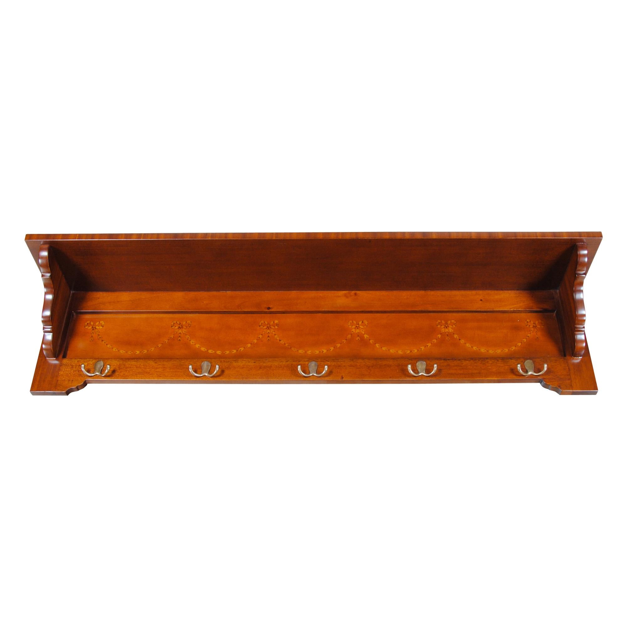 The Mahogany Coat Rack Shelf by Niagara Furniture is a great accessory that is both useful and decorative. Created from the finest mahogany solids and veneers the overall shape and style of the piece will fit in with almost any decor and add a