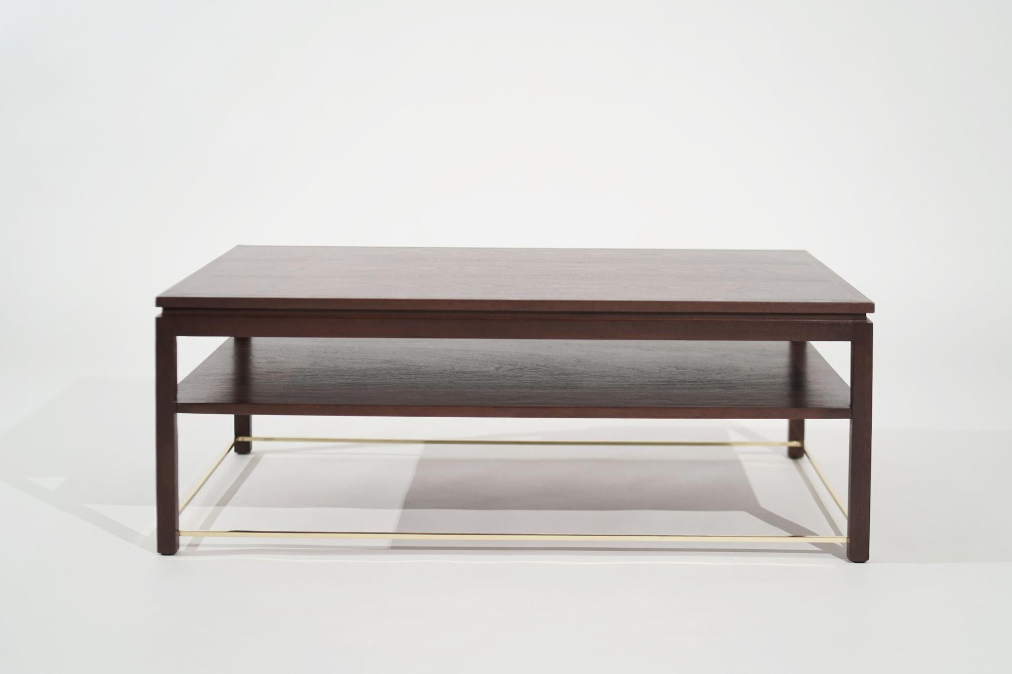 Stunning mahogany coffee table designed by the renowned Edward Wormley for Dunbar in the 1950s, now fully restored by the experts at Stamford Modern. This exquisite piece of furniture is the epitome of mid-century modern design, with its sleek lines