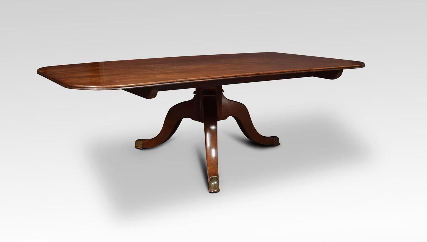 Regency mahogany coffee table, the rectangular top and moulded edge raised on tapering column terminating in pedestal base this table has been reduced to coffee table height
Dimensions:
Height 20.5 inches
Width 64.5 inches
Depth 37 inches.